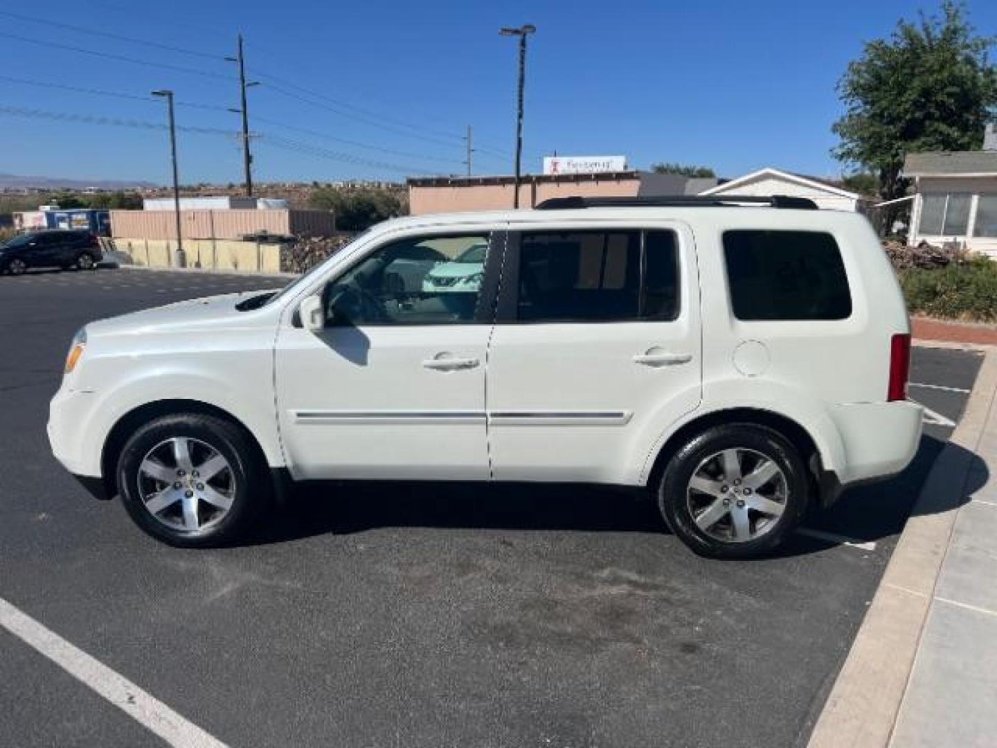 2012 White Diamond Pearl /Gray Leather Interio Honda Pilot Touring 4WD 5-Spd AT (5FNYF4H90CB) with an 3.5L V6 SOHC 24V engine, 5-Speed Automatic transmission, located at 1865 East Red Hills Pkwy, St. George, 84770, (435) 628-0023, 37.120850, -113.543640 - We specialize in helping ALL people get the best financing available. No matter your credit score, good, bad or none we can get you an amazing rate. Had a bankruptcy, divorce, or repossessions? We give you the green light to get your credit back on the road. Low down and affordable payments that fit - Photo#3