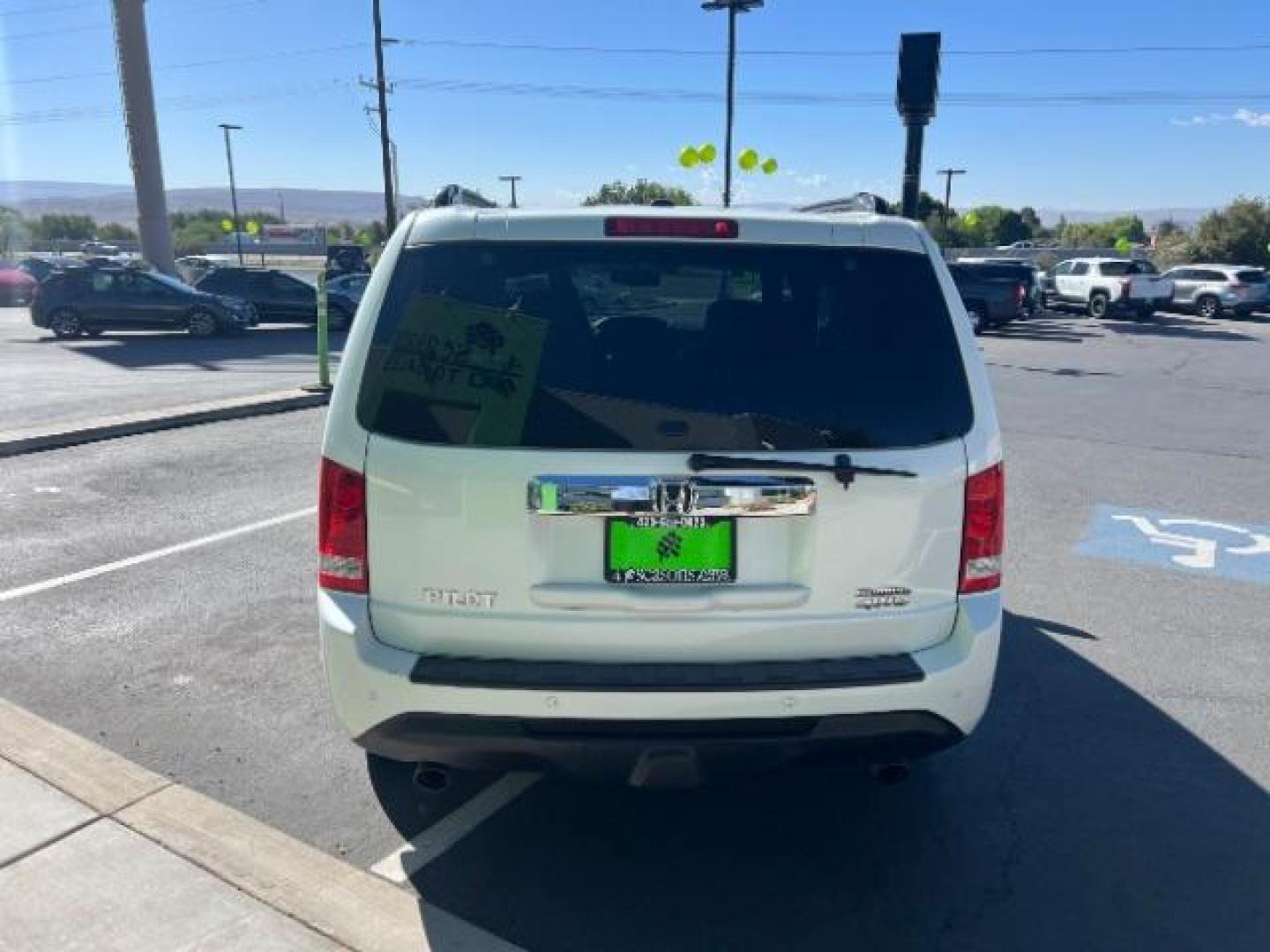 2012 White Diamond Pearl /Gray Leather Interio Honda Pilot Touring 4WD 5-Spd AT (5FNYF4H90CB) with an 3.5L V6 SOHC 24V engine, 5-Speed Automatic transmission, located at 1865 East Red Hills Pkwy, St. George, 84770, (435) 628-0023, 37.120850, -113.543640 - We specialize in helping ALL people get the best financing available. No matter your credit score, good, bad or none we can get you an amazing rate. Had a bankruptcy, divorce, or repossessions? We give you the green light to get your credit back on the road. Low down and affordable payments that fit - Photo#5