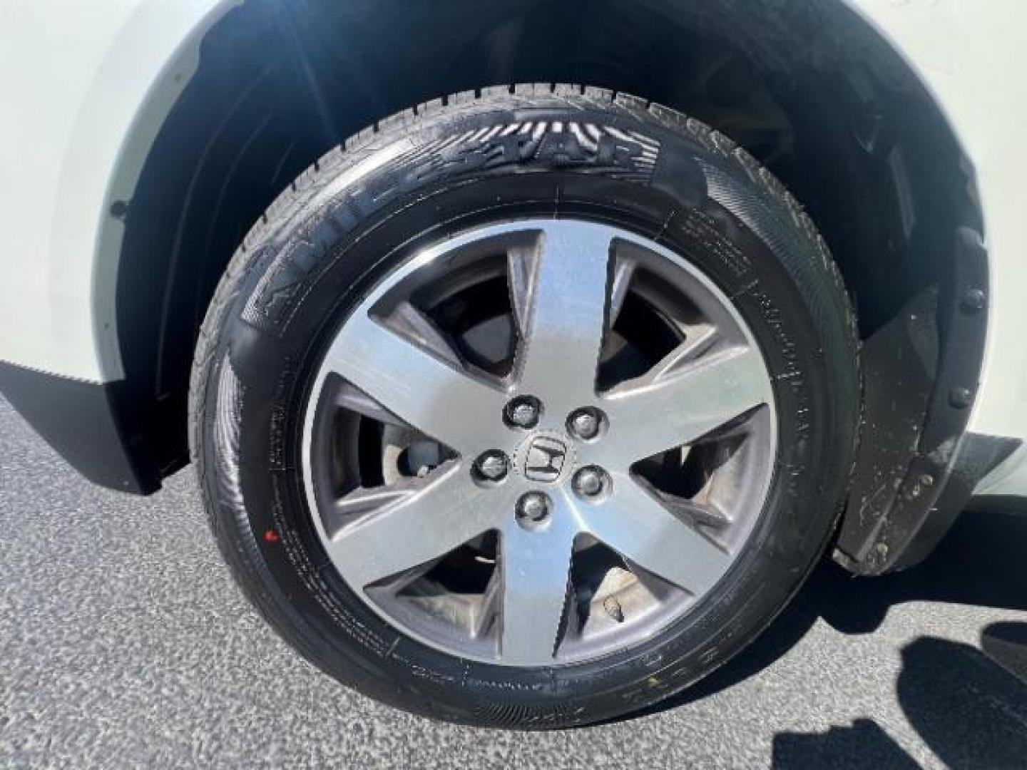 2012 White Diamond Pearl /Gray Leather Interio Honda Pilot Touring 4WD 5-Spd AT (5FNYF4H90CB) with an 3.5L V6 SOHC 24V engine, 5-Speed Automatic transmission, located at 1865 East Red Hills Pkwy, St. George, 84770, (435) 628-0023, 37.120850, -113.543640 - We specialize in helping ALL people get the best financing available. No matter your credit score, good, bad or none we can get you an amazing rate. Had a bankruptcy, divorce, or repossessions? We give you the green light to get your credit back on the road. Low down and affordable payments that fit - Photo#11