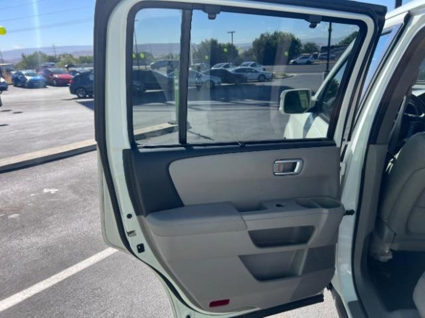 2012 White Diamond Pearl /Gray Leather Interio Honda Pilot Touring 4WD 5-Spd AT (5FNYF4H90CB) with an 3.5L V6 SOHC 24V engine, 5-Speed Automatic transmission, located at 1865 East Red Hills Pkwy, St. George, 84770, (435) 628-0023, 37.120850, -113.543640 - We specialize in helping ALL people get the best financing available. No matter your credit score, good, bad or none we can get you an amazing rate. Had a bankruptcy, divorce, or repossessions? We give you the green light to get your credit back on the road. Low down and affordable payments that fit - Photo#20
