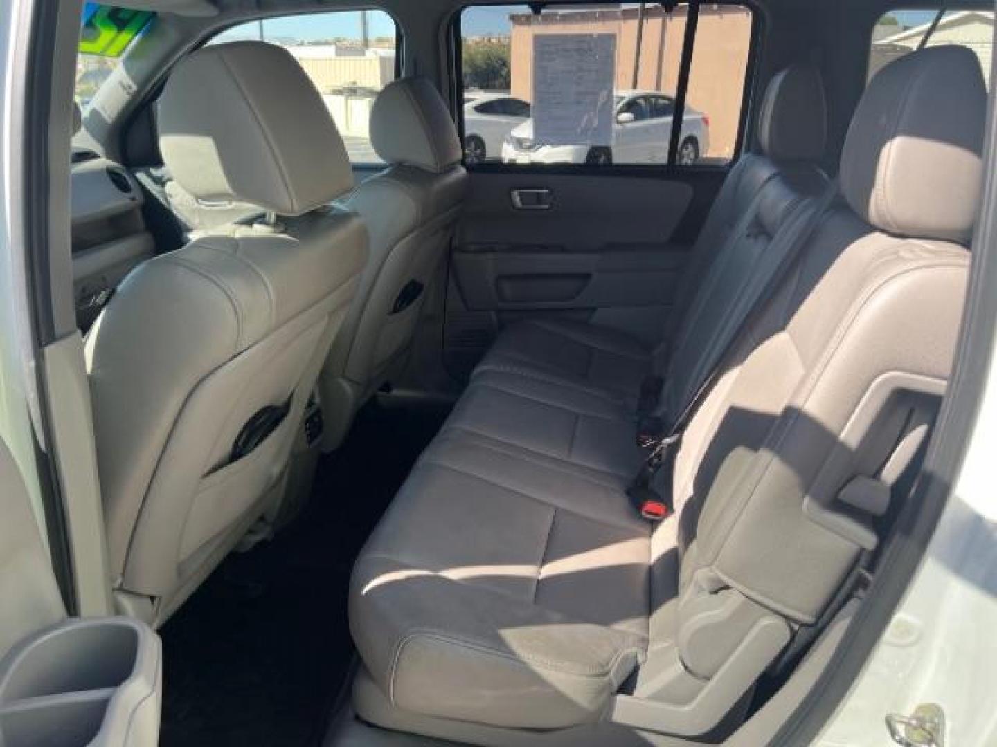 2012 White Diamond Pearl /Gray Leather Interio Honda Pilot Touring 4WD 5-Spd AT (5FNYF4H90CB) with an 3.5L V6 SOHC 24V engine, 5-Speed Automatic transmission, located at 1865 East Red Hills Pkwy, St. George, 84770, (435) 628-0023, 37.120850, -113.543640 - We specialize in helping ALL people get the best financing available. No matter your credit score, good, bad or none we can get you an amazing rate. Had a bankruptcy, divorce, or repossessions? We give you the green light to get your credit back on the road. Low down and affordable payments that fit - Photo#21