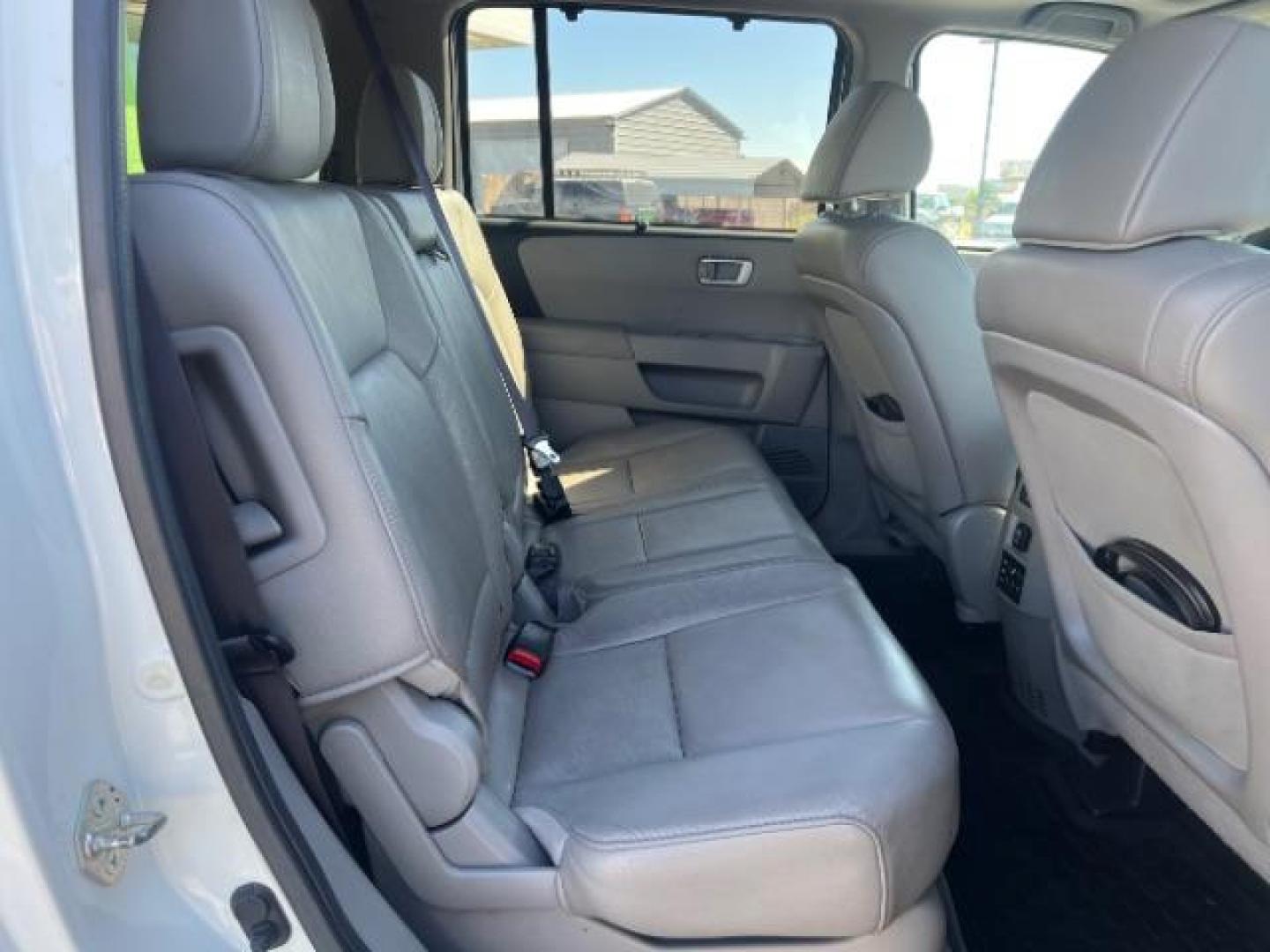 2012 White Diamond Pearl /Gray Leather Interio Honda Pilot Touring 4WD 5-Spd AT (5FNYF4H90CB) with an 3.5L V6 SOHC 24V engine, 5-Speed Automatic transmission, located at 1865 East Red Hills Pkwy, St. George, 84770, (435) 628-0023, 37.120850, -113.543640 - We specialize in helping ALL people get the best financing available. No matter your credit score, good, bad or none we can get you an amazing rate. Had a bankruptcy, divorce, or repossessions? We give you the green light to get your credit back on the road. Low down and affordable payments that fit - Photo#31