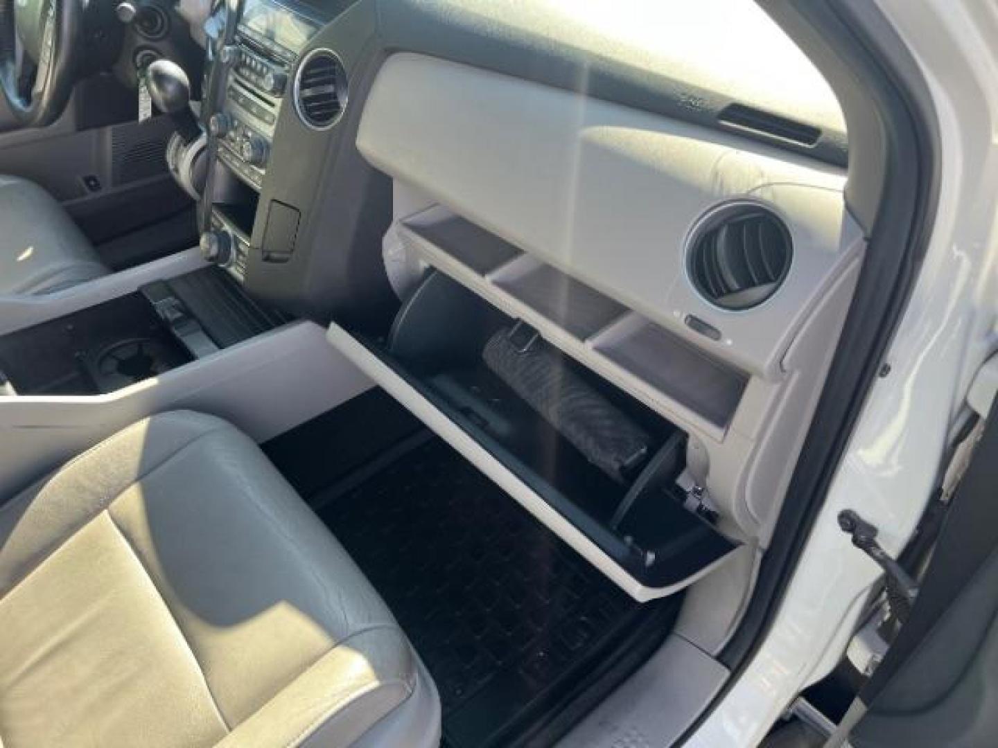 2012 White Diamond Pearl /Gray Leather Interio Honda Pilot Touring 4WD 5-Spd AT (5FNYF4H90CB) with an 3.5L V6 SOHC 24V engine, 5-Speed Automatic transmission, located at 1865 East Red Hills Pkwy, St. George, 84770, (435) 628-0023, 37.120850, -113.543640 - We specialize in helping ALL people get the best financing available. No matter your credit score, good, bad or none we can get you an amazing rate. Had a bankruptcy, divorce, or repossessions? We give you the green light to get your credit back on the road. Low down and affordable payments that fit - Photo#34