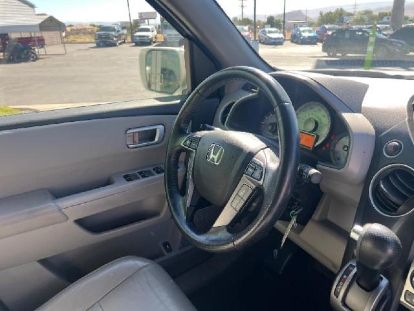 2012 White Diamond Pearl /Gray Leather Interio Honda Pilot Touring 4WD 5-Spd AT (5FNYF4H90CB) with an 3.5L V6 SOHC 24V engine, 5-Speed Automatic transmission, located at 1865 East Red Hills Pkwy, St. George, 84770, (435) 628-0023, 37.120850, -113.543640 - We specialize in helping ALL people get the best financing available. No matter your credit score, good, bad or none we can get you an amazing rate. Had a bankruptcy, divorce, or repossessions? We give you the green light to get your credit back on the road. Low down and affordable payments that fit - Photo#35