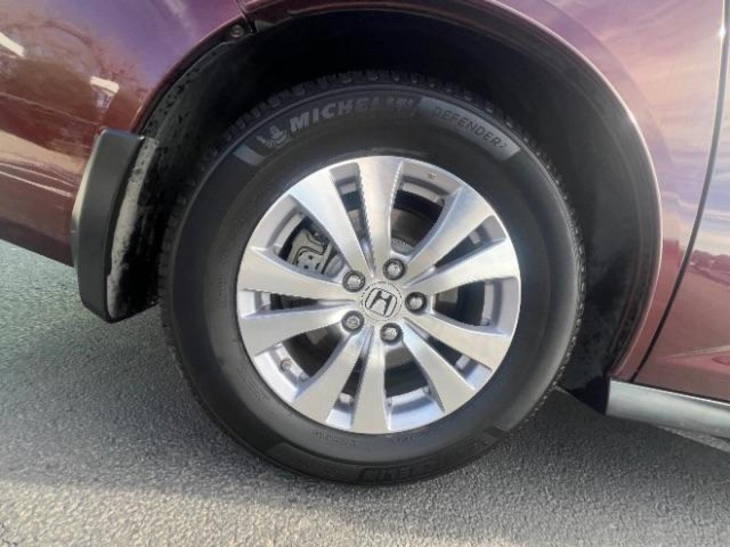 2017 Deep Scarlet Pearl /Beige, leather Honda Odyssey EX-L (5FNRL5H6XHB) with an 3.5L V6 SOHC 24V engine, 6-Speed Automatic transmission, located at 1865 East Red Hills Pkwy, St. George, 84770, (435) 628-0023, 37.120850, -113.543640 - We specialize in helping ALL people get the best financing available. No matter your credit score, good, bad or none we can get you an amazing rate. Had a bankruptcy, divorce, or repossessions? We give you the green light to get your credit back on the road. Low down and affordable payments that fit - Photo#9