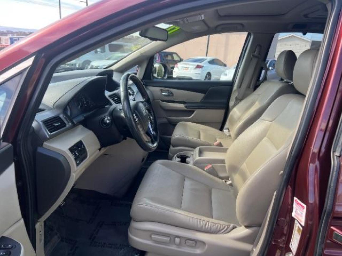 2017 Deep Scarlet Pearl /Beige, leather Honda Odyssey EX-L (5FNRL5H6XHB) with an 3.5L V6 SOHC 24V engine, 6-Speed Automatic transmission, located at 1865 East Red Hills Pkwy, St. George, 84770, (435) 628-0023, 37.120850, -113.543640 - We specialize in helping ALL people get the best financing available. No matter your credit score, good, bad or none we can get you an amazing rate. Had a bankruptcy, divorce, or repossessions? We give you the green light to get your credit back on the road. Low down and affordable payments that fit - Photo#14