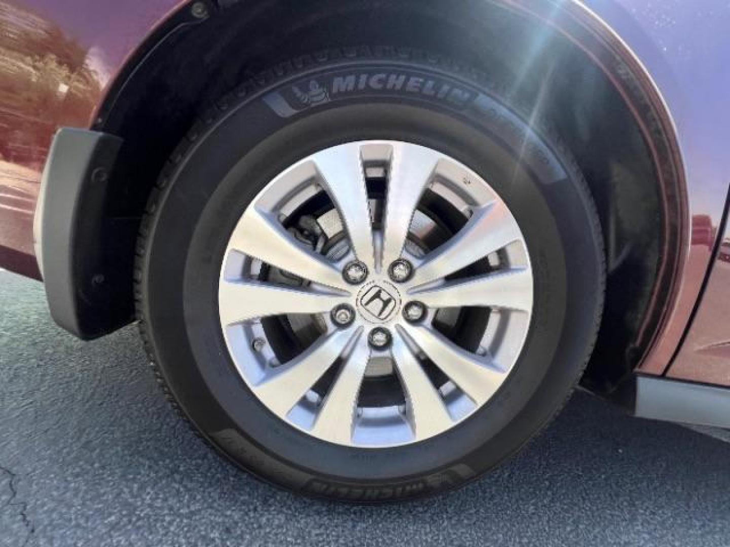 2017 Deep Scarlet Pearl /Beige, leather Honda Odyssey EX-L (5FNRL5H6XHB) with an 3.5L V6 SOHC 24V engine, 6-Speed Automatic transmission, located at 1865 East Red Hills Pkwy, St. George, 84770, (435) 628-0023, 37.120850, -113.543640 - We specialize in helping ALL people get the best financing available. No matter your credit score, good, bad or none we can get you an amazing rate. Had a bankruptcy, divorce, or repossessions? We give you the green light to get your credit back on the road. Low down and affordable payments that fit- Photo#8