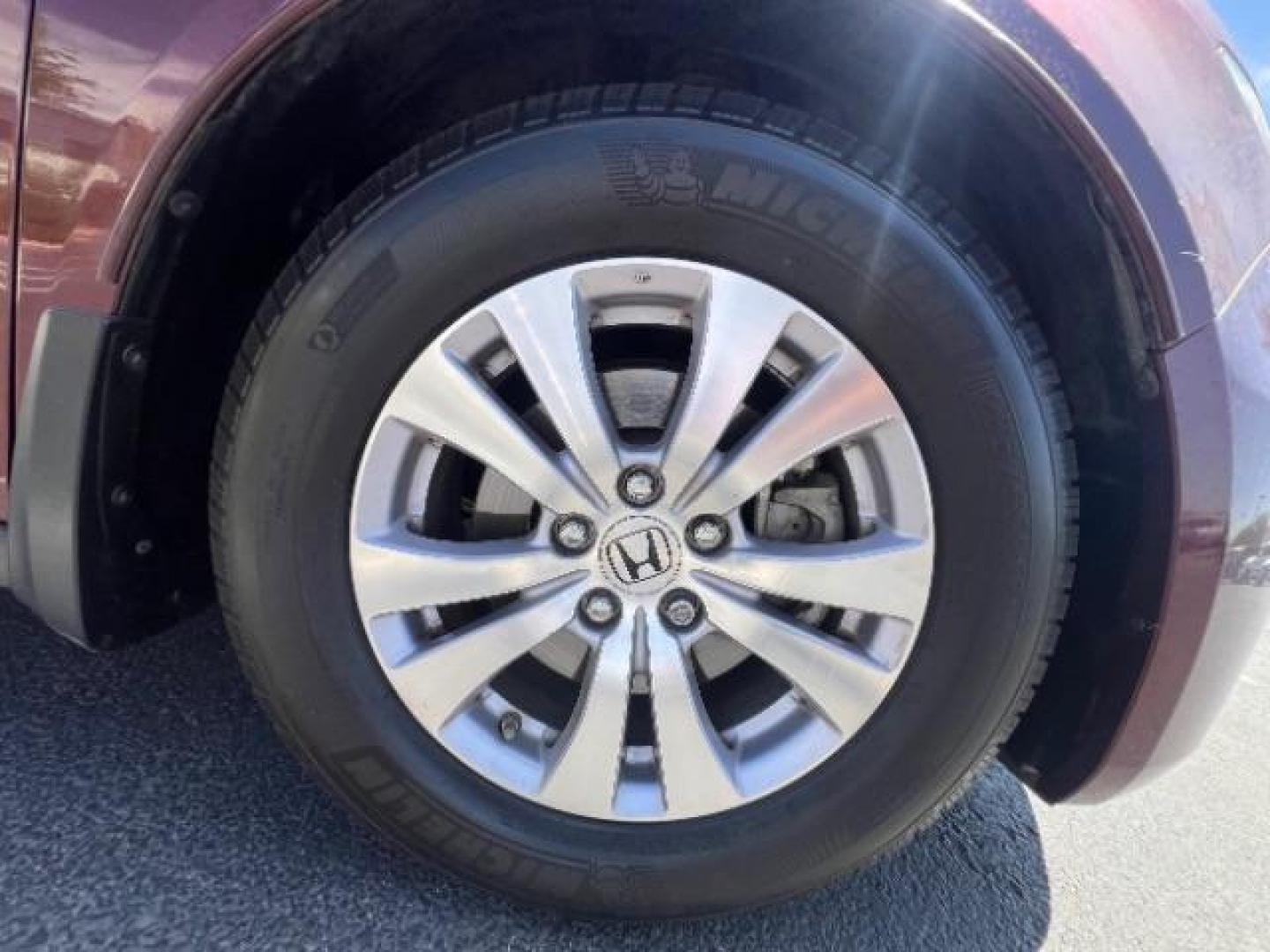 2017 Deep Scarlet Pearl /Beige, leather Honda Odyssey EX-L (5FNRL5H6XHB) with an 3.5L V6 SOHC 24V engine, 6-Speed Automatic transmission, located at 1865 East Red Hills Pkwy, St. George, 84770, (435) 628-0023, 37.120850, -113.543640 - We specialize in helping ALL people get the best financing available. No matter your credit score, good, bad or none we can get you an amazing rate. Had a bankruptcy, divorce, or repossessions? We give you the green light to get your credit back on the road. Low down and affordable payments that fit- Photo#9