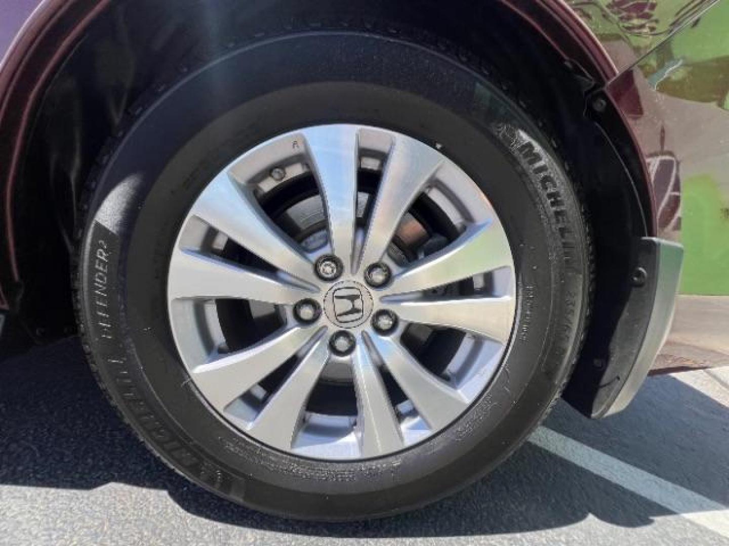 2017 Deep Scarlet Pearl /Beige, leather Honda Odyssey EX-L (5FNRL5H6XHB) with an 3.5L V6 SOHC 24V engine, 6-Speed Automatic transmission, located at 1865 East Red Hills Pkwy, St. George, 84770, (435) 628-0023, 37.120850, -113.543640 - We specialize in helping ALL people get the best financing available. No matter your credit score, good, bad or none we can get you an amazing rate. Had a bankruptcy, divorce, or repossessions? We give you the green light to get your credit back on the road. Low down and affordable payments that fit- Photo#11