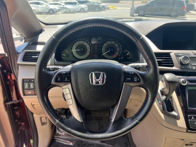 2017 Deep Scarlet Pearl /Beige, leather Honda Odyssey EX-L (5FNRL5H6XHB) with an 3.5L V6 SOHC 24V engine, 6-Speed Automatic transmission, located at 1865 East Red Hills Pkwy, St. George, 84770, (435) 628-0023, 37.120850, -113.543640 - We specialize in helping ALL people get the best financing available. No matter your credit score, good, bad or none we can get you an amazing rate. Had a bankruptcy, divorce, or repossessions? We give you the green light to get your credit back on the road. Low down and affordable payments that fit - Photo#15