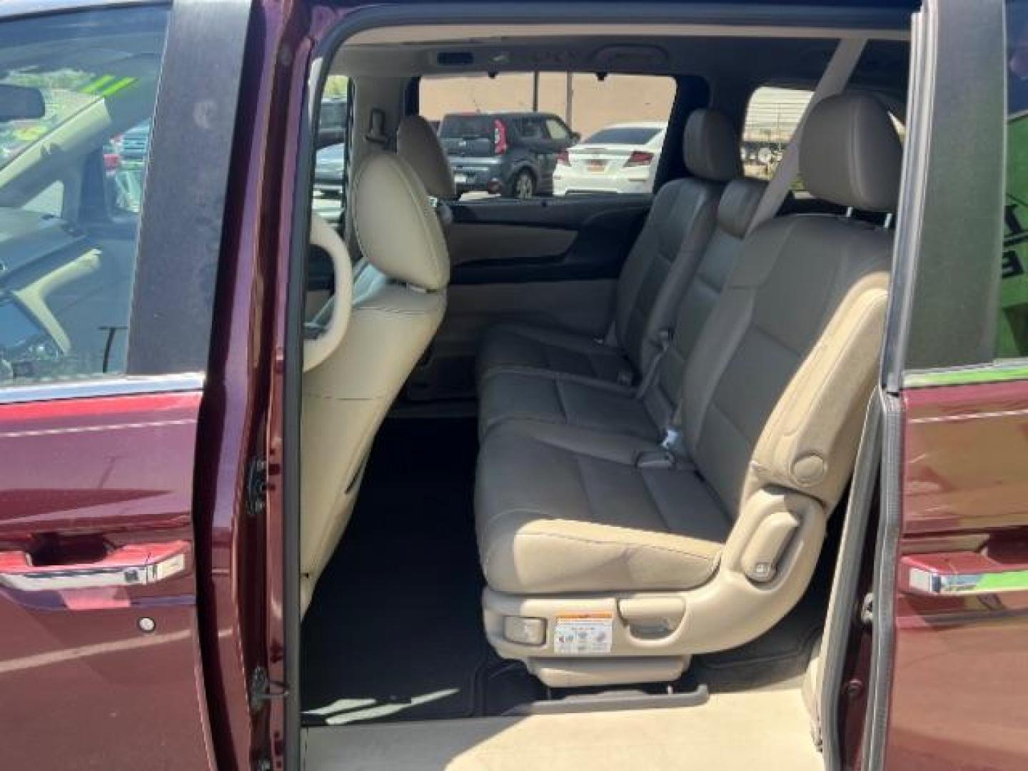 2017 Deep Scarlet Pearl /Beige, leather Honda Odyssey EX-L (5FNRL5H6XHB) with an 3.5L V6 SOHC 24V engine, 6-Speed Automatic transmission, located at 1865 East Red Hills Pkwy, St. George, 84770, (435) 628-0023, 37.120850, -113.543640 - We specialize in helping ALL people get the best financing available. No matter your credit score, good, bad or none we can get you an amazing rate. Had a bankruptcy, divorce, or repossessions? We give you the green light to get your credit back on the road. Low down and affordable payments that fit- Photo#19