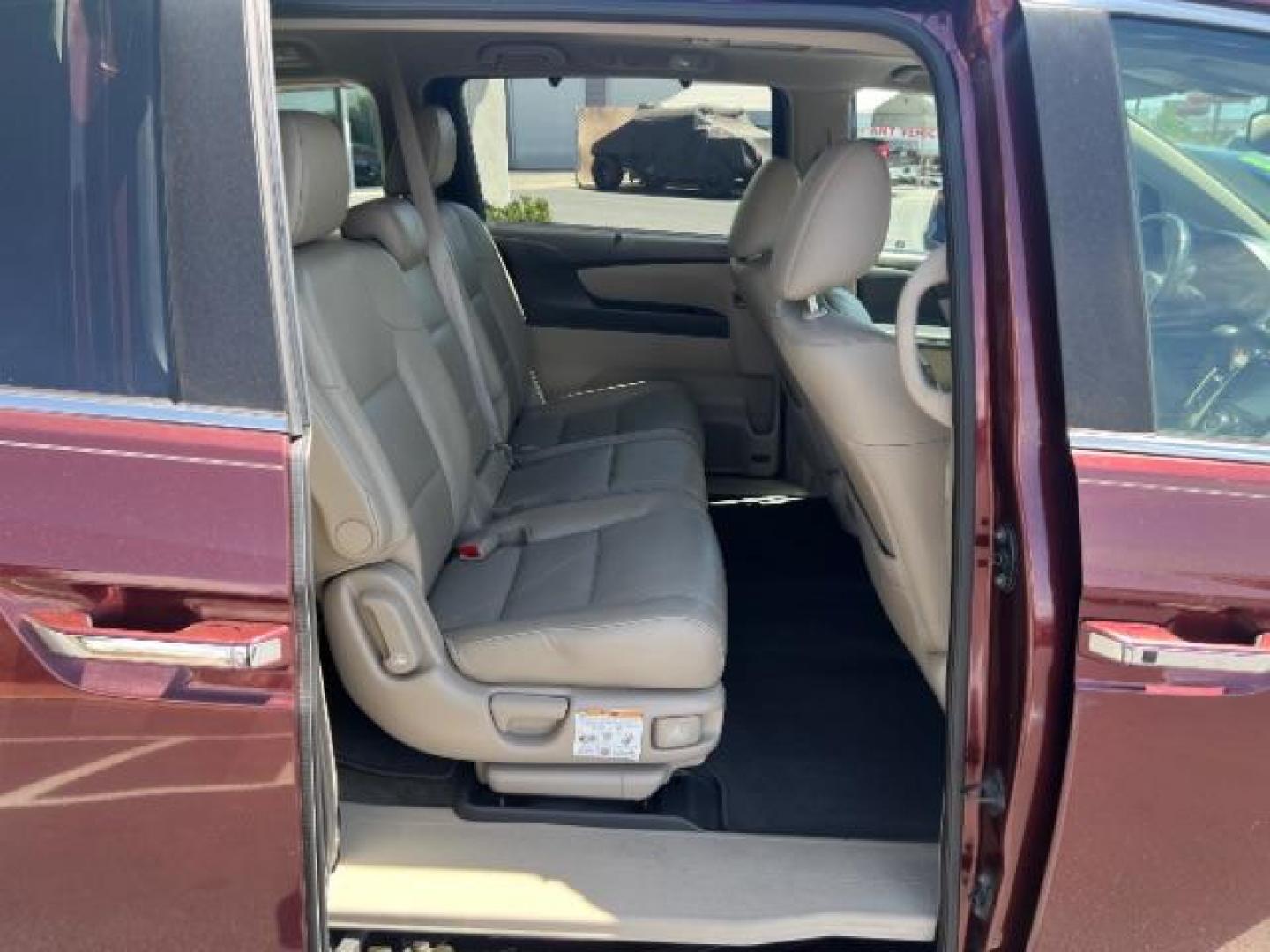 2017 Deep Scarlet Pearl /Beige, leather Honda Odyssey EX-L (5FNRL5H6XHB) with an 3.5L V6 SOHC 24V engine, 6-Speed Automatic transmission, located at 1865 East Red Hills Pkwy, St. George, 84770, (435) 628-0023, 37.120850, -113.543640 - We specialize in helping ALL people get the best financing available. No matter your credit score, good, bad or none we can get you an amazing rate. Had a bankruptcy, divorce, or repossessions? We give you the green light to get your credit back on the road. Low down and affordable payments that fit- Photo#26