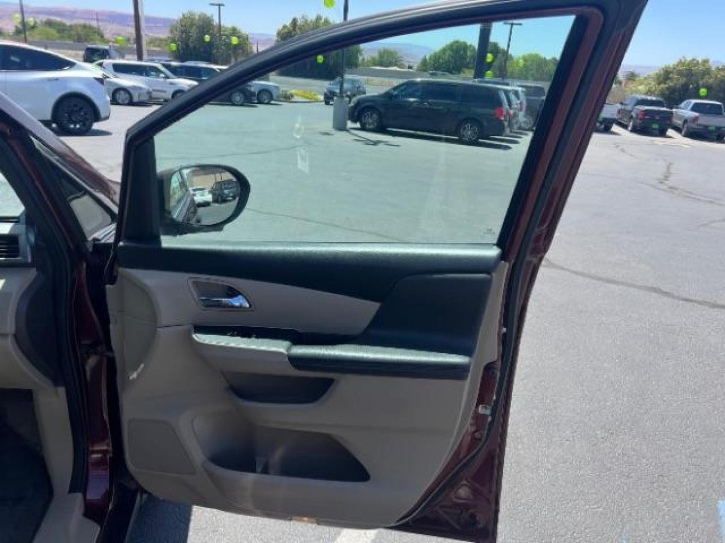 2017 Deep Scarlet Pearl /Beige, leather Honda Odyssey EX-L (5FNRL5H6XHB) with an 3.5L V6 SOHC 24V engine, 6-Speed Automatic transmission, located at 1865 East Red Hills Pkwy, St. George, 84770, (435) 628-0023, 37.120850, -113.543640 - We specialize in helping ALL people get the best financing available. No matter your credit score, good, bad or none we can get you an amazing rate. Had a bankruptcy, divorce, or repossessions? We give you the green light to get your credit back on the road. Low down and affordable payments that fit- Photo#27