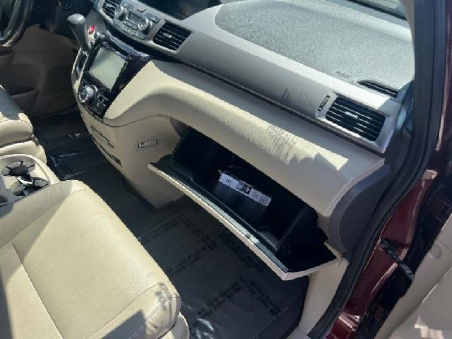 2017 Deep Scarlet Pearl /Beige, leather Honda Odyssey EX-L (5FNRL5H6XHB) with an 3.5L V6 SOHC 24V engine, 6-Speed Automatic transmission, located at 1865 East Red Hills Pkwy, St. George, 84770, (435) 628-0023, 37.120850, -113.543640 - We specialize in helping ALL people get the best financing available. No matter your credit score, good, bad or none we can get you an amazing rate. Had a bankruptcy, divorce, or repossessions? We give you the green light to get your credit back on the road. Low down and affordable payments that fit- Photo#29