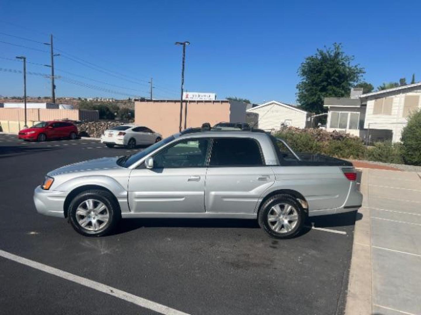 2006 Brilliant Silver Met /Dark Gray Cloth Inte Subaru Baja Turbo (4S4BT63C465) with an 2.5L H4 DOHC 16V TUR engine, 4-Speed Automatic transmission, located at 940 North Main Street, Cedar City, UT, 84720, (435) 628-0023, 37.692936, -113.061897 - We specialize in helping ALL people get the best financing available. No matter your credit score, good, bad or none we can get you an amazing rate. Had a bankruptcy, divorce, or repossessions? We give you the green light to get your credit back on the road. Low down and affordable payments that fit - Photo#3
