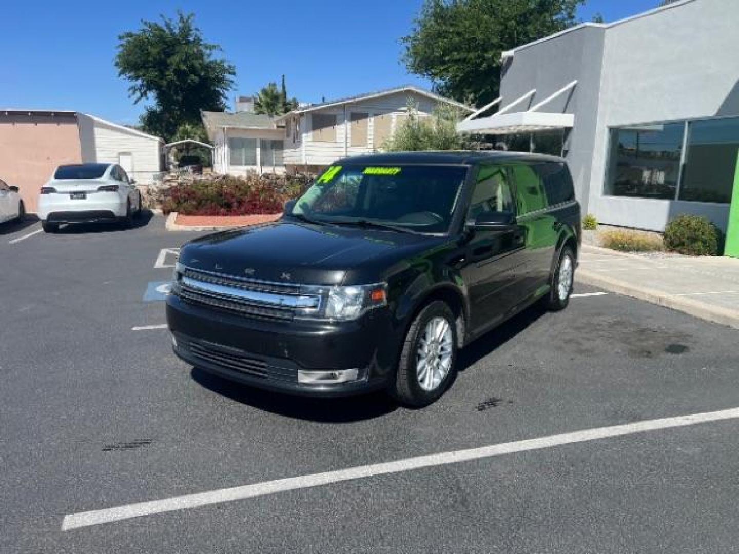 2014 Tuxedo Black Metallic /Charcoal Black Ford Flex SEL FWD (2FMGK5C83EB) with an 3.5L V6 DOHC 24V engine, 6-Speed Automatic Overdrive transmission, located at 1865 East Red Hills Pkwy, St. George, 84770, (435) 628-0023, 37.120850, -113.543640 - We specialize in helping ALL people get the best financing available. No matter your credit score, good, bad or none we can get you an amazing rate. Had a bankruptcy, divorce, or repossessions? We give you the green light to get your credit back on the road. Low down and affordable payments that fit - Photo#2
