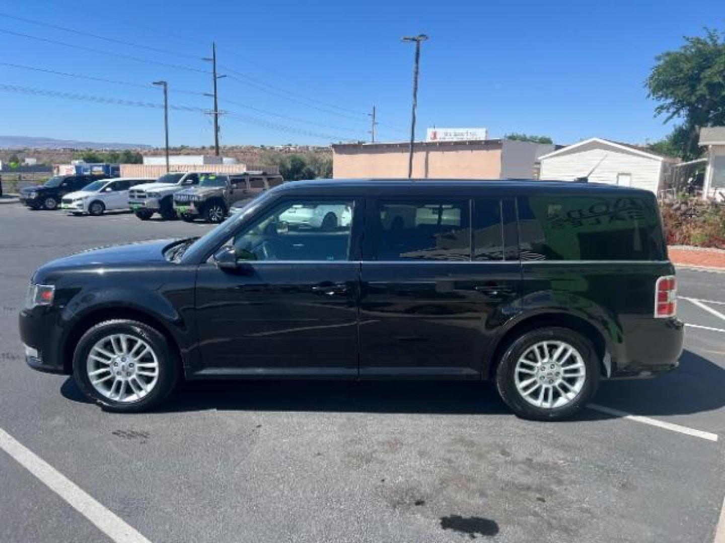 2014 Tuxedo Black Metallic /Charcoal Black Ford Flex SEL FWD (2FMGK5C83EB) with an 3.5L V6 DOHC 24V engine, 6-Speed Automatic Overdrive transmission, located at 1865 East Red Hills Pkwy, St. George, 84770, (435) 628-0023, 37.120850, -113.543640 - We specialize in helping ALL people get the best financing available. No matter your credit score, good, bad or none we can get you an amazing rate. Had a bankruptcy, divorce, or repossessions? We give you the green light to get your credit back on the road. Low down and affordable payments that fit - Photo#3