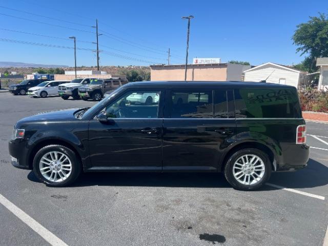 2014 Tuxedo Black Metallic /Charcoal Black Ford Flex SEL FWD (2FMGK5C83EB) with an 3.5L V6 DOHC 24V engine, 6-Speed Automatic Overdrive transmission, located at 1865 East Red Hills Pkwy, St. George, 84770, (435) 628-0023, 37.120850, -113.543640 - We specialize in helping ALL people get the best financing available. No matter your credit score, good, bad or none we can get you an amazing rate. Had a bankruptcy, divorce, or repossessions? We give you the green light to get your credit back on the road. Low down and affordable payments that fit - Photo#3