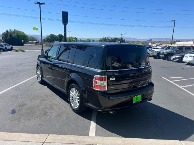 2014 Tuxedo Black Metallic /Charcoal Black Ford Flex SEL FWD (2FMGK5C83EB) with an 3.5L V6 DOHC 24V engine, 6-Speed Automatic Overdrive transmission, located at 1865 East Red Hills Pkwy, St. George, 84770, (435) 628-0023, 37.120850, -113.543640 - We specialize in helping ALL people get the best financing available. No matter your credit score, good, bad or none we can get you an amazing rate. Had a bankruptcy, divorce, or repossessions? We give you the green light to get your credit back on the road. Low down and affordable payments that fit - Photo#4