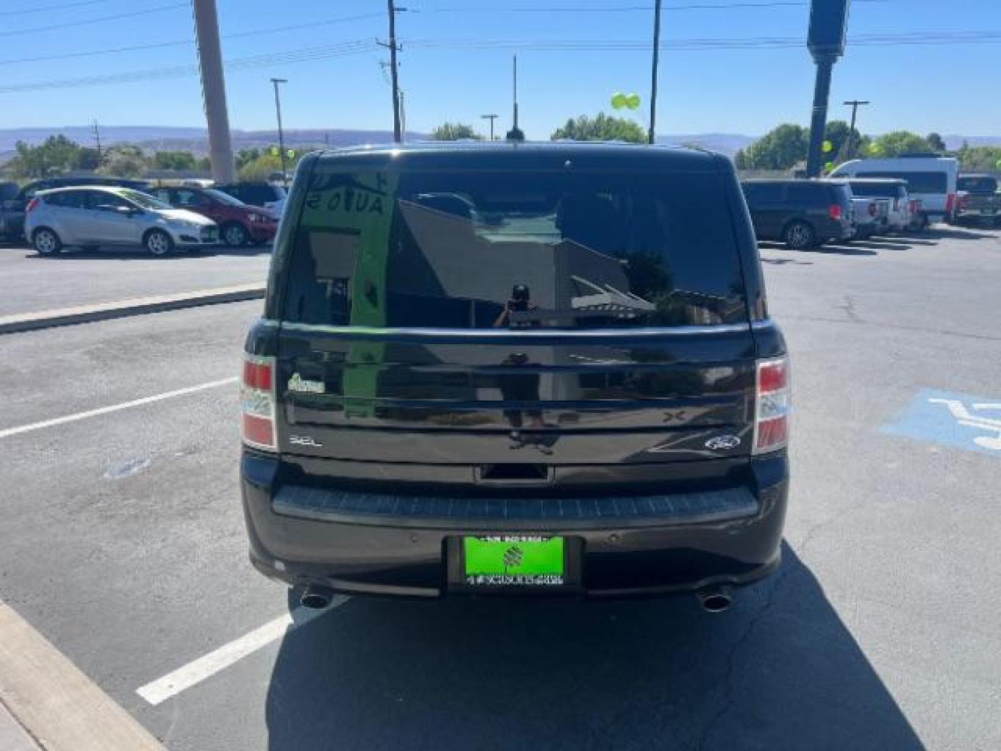 2014 Tuxedo Black Metallic /Charcoal Black Ford Flex SEL FWD (2FMGK5C83EB) with an 3.5L V6 DOHC 24V engine, 6-Speed Automatic Overdrive transmission, located at 1865 East Red Hills Pkwy, St. George, 84770, (435) 628-0023, 37.120850, -113.543640 - We specialize in helping ALL people get the best financing available. No matter your credit score, good, bad or none we can get you an amazing rate. Had a bankruptcy, divorce, or repossessions? We give you the green light to get your credit back on the road. Low down and affordable payments that fit - Photo#5