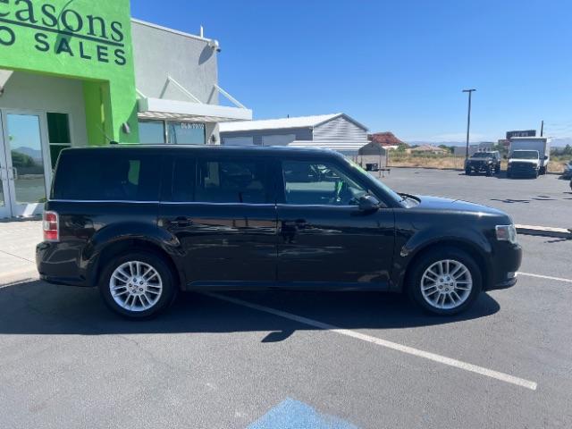 2014 Tuxedo Black Metallic /Charcoal Black Ford Flex SEL FWD (2FMGK5C83EB) with an 3.5L V6 DOHC 24V engine, 6-Speed Automatic Overdrive transmission, located at 1865 East Red Hills Pkwy, St. George, 84770, (435) 628-0023, 37.120850, -113.543640 - We specialize in helping ALL people get the best financing available. No matter your credit score, good, bad or none we can get you an amazing rate. Had a bankruptcy, divorce, or repossessions? We give you the green light to get your credit back on the road. Low down and affordable payments that fit - Photo#7