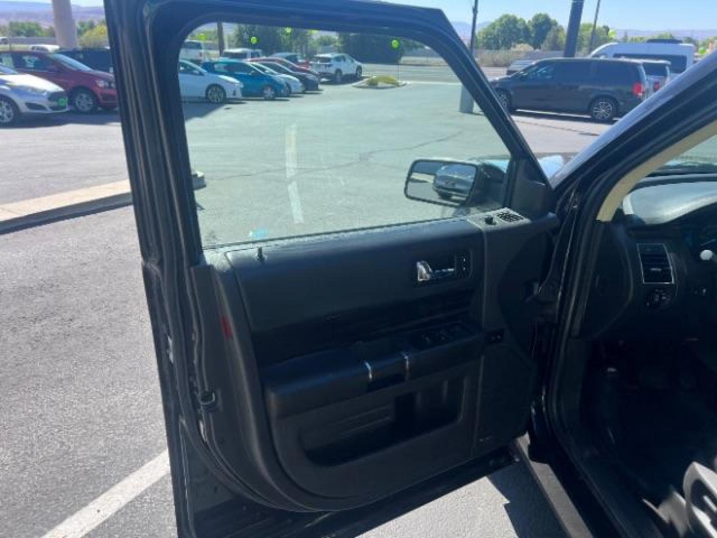 2014 Tuxedo Black Metallic /Charcoal Black Ford Flex SEL FWD (2FMGK5C83EB) with an 3.5L V6 DOHC 24V engine, 6-Speed Automatic Overdrive transmission, located at 1865 East Red Hills Pkwy, St. George, 84770, (435) 628-0023, 37.120850, -113.543640 - We specialize in helping ALL people get the best financing available. No matter your credit score, good, bad or none we can get you an amazing rate. Had a bankruptcy, divorce, or repossessions? We give you the green light to get your credit back on the road. Low down and affordable payments that fit - Photo#12