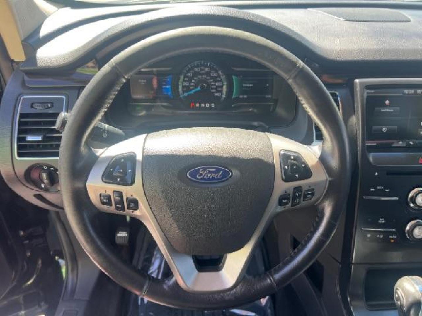 2014 Tuxedo Black Metallic /Charcoal Black Ford Flex SEL FWD (2FMGK5C83EB) with an 3.5L V6 DOHC 24V engine, 6-Speed Automatic Overdrive transmission, located at 1865 East Red Hills Pkwy, St. George, 84770, (435) 628-0023, 37.120850, -113.543640 - We specialize in helping ALL people get the best financing available. No matter your credit score, good, bad or none we can get you an amazing rate. Had a bankruptcy, divorce, or repossessions? We give you the green light to get your credit back on the road. Low down and affordable payments that fit - Photo#15