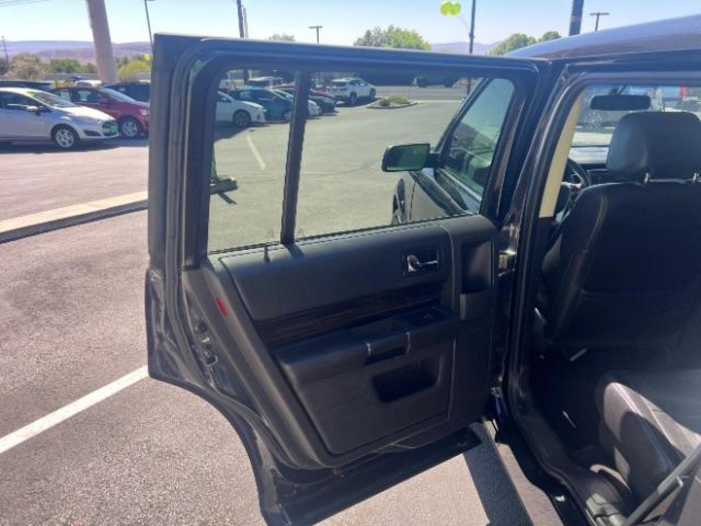 2014 Tuxedo Black Metallic /Charcoal Black Ford Flex SEL FWD (2FMGK5C83EB) with an 3.5L V6 DOHC 24V engine, 6-Speed Automatic Overdrive transmission, located at 1865 East Red Hills Pkwy, St. George, 84770, (435) 628-0023, 37.120850, -113.543640 - We specialize in helping ALL people get the best financing available. No matter your credit score, good, bad or none we can get you an amazing rate. Had a bankruptcy, divorce, or repossessions? We give you the green light to get your credit back on the road. Low down and affordable payments that fit - Photo#20