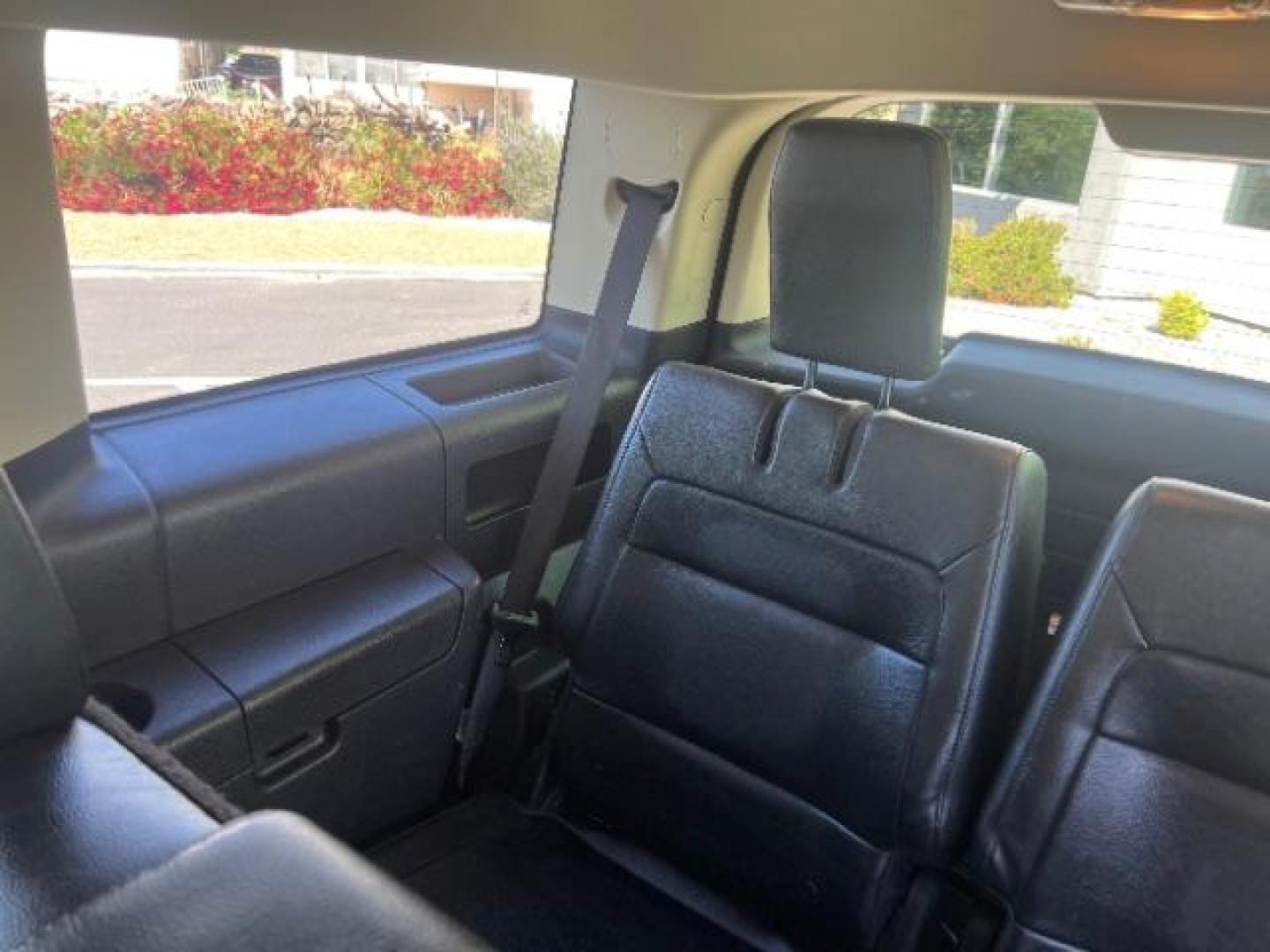 2014 Tuxedo Black Metallic /Charcoal Black Ford Flex SEL FWD (2FMGK5C83EB) with an 3.5L V6 DOHC 24V engine, 6-Speed Automatic Overdrive transmission, located at 1865 East Red Hills Pkwy, St. George, 84770, (435) 628-0023, 37.120850, -113.543640 - We specialize in helping ALL people get the best financing available. No matter your credit score, good, bad or none we can get you an amazing rate. Had a bankruptcy, divorce, or repossessions? We give you the green light to get your credit back on the road. Low down and affordable payments that fit - Photo#23