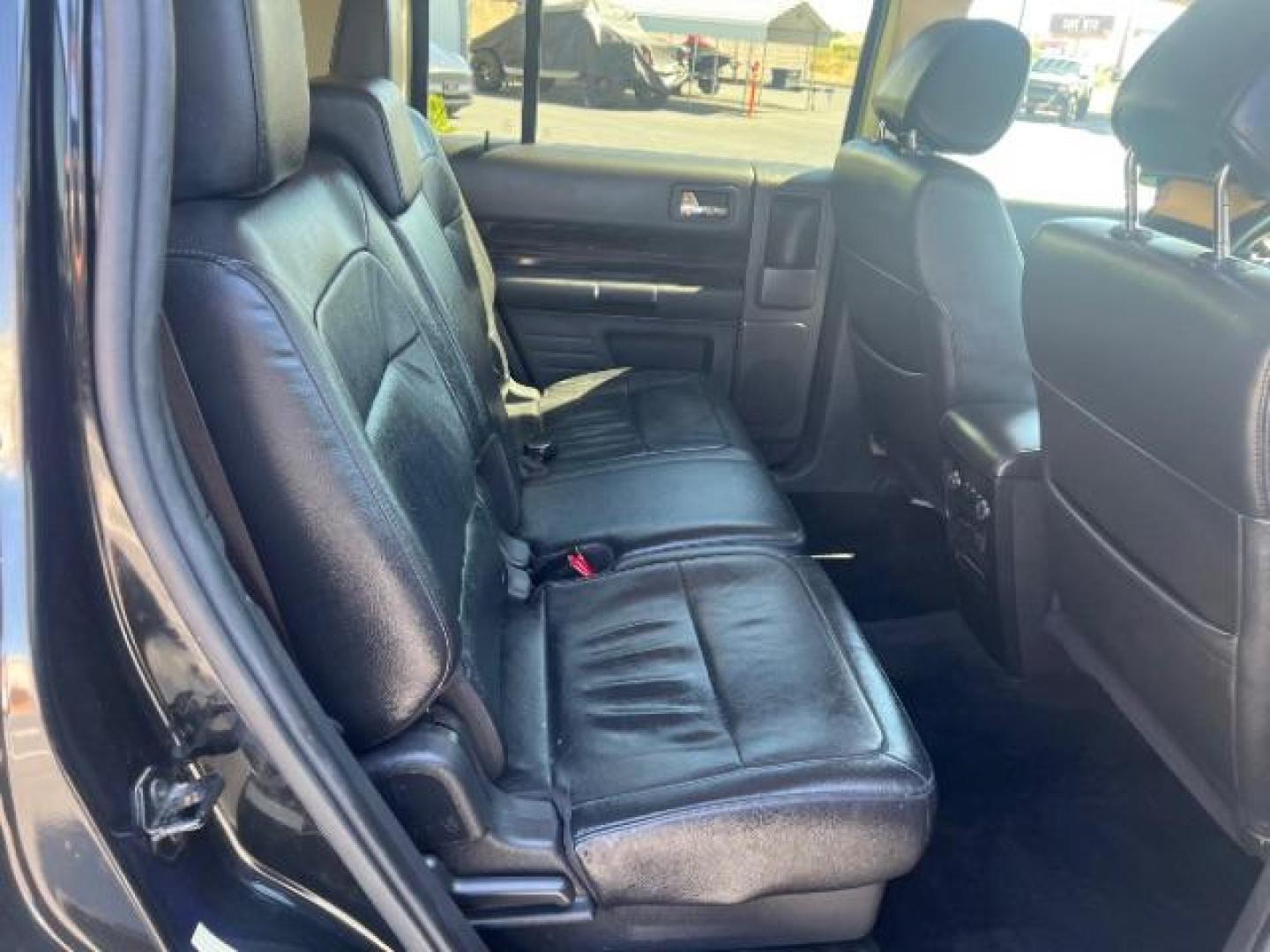 2014 Tuxedo Black Metallic /Charcoal Black Ford Flex SEL FWD (2FMGK5C83EB) with an 3.5L V6 DOHC 24V engine, 6-Speed Automatic Overdrive transmission, located at 1865 East Red Hills Pkwy, St. George, 84770, (435) 628-0023, 37.120850, -113.543640 - We specialize in helping ALL people get the best financing available. No matter your credit score, good, bad or none we can get you an amazing rate. Had a bankruptcy, divorce, or repossessions? We give you the green light to get your credit back on the road. Low down and affordable payments that fit - Photo#28
