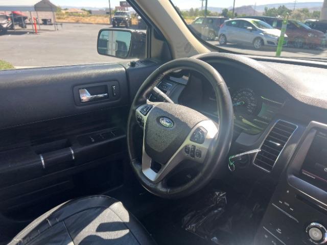 2014 Tuxedo Black Metallic /Charcoal Black Ford Flex SEL FWD (2FMGK5C83EB) with an 3.5L V6 DOHC 24V engine, 6-Speed Automatic Overdrive transmission, located at 1865 East Red Hills Pkwy, St. George, 84770, (435) 628-0023, 37.120850, -113.543640 - We specialize in helping ALL people get the best financing available. No matter your credit score, good, bad or none we can get you an amazing rate. Had a bankruptcy, divorce, or repossessions? We give you the green light to get your credit back on the road. Low down and affordable payments that fit - Photo#32