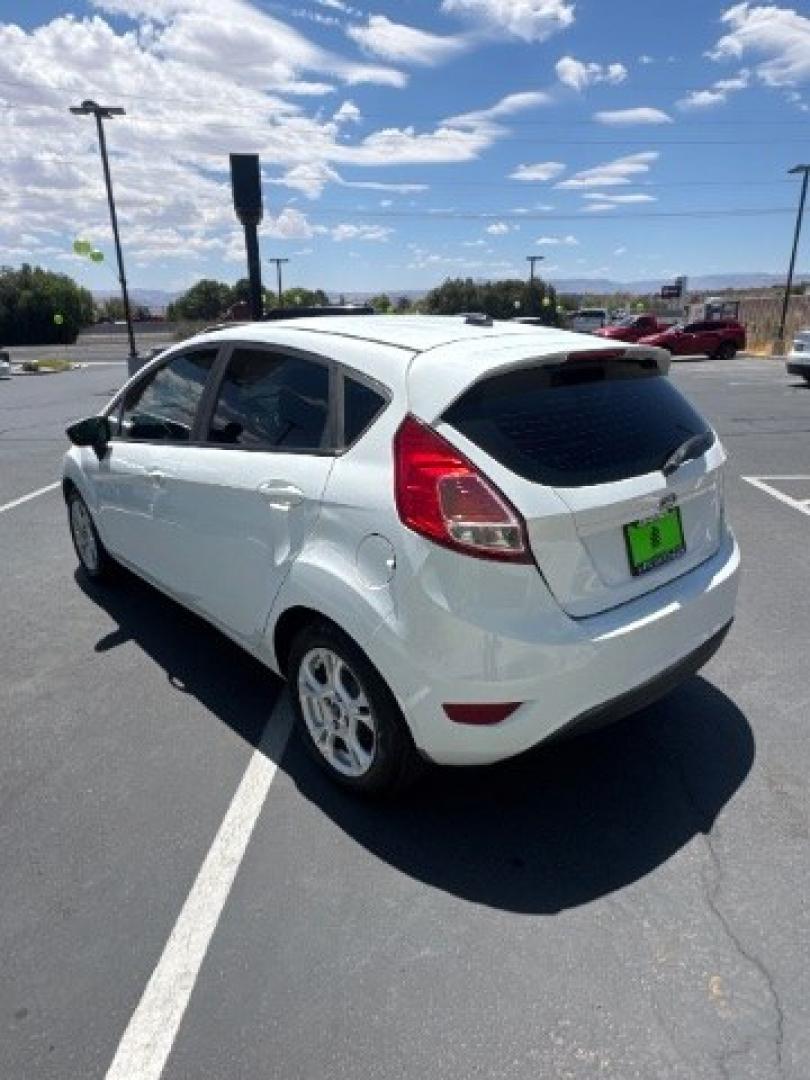 2015 Oxford White /Medium Light Stone Ford Fiesta SE Hatchback (3FADP4EJ4FM) with an 1.6L L4 DOHC 16V engine, 6-Speed Automatic transmission, located at 1865 East Red Hills Pkwy, St. George, 84770, (435) 628-0023, 37.120850, -113.543640 - We specialize in helping ALL people get the best financing available. No matter your credit score, good, bad or none we can get you an amazing rate. Had a bankruptcy, divorce, or repossessions? We give you the green light to get your credit back on the road. Low down and affordable payments that fit- Photo#5
