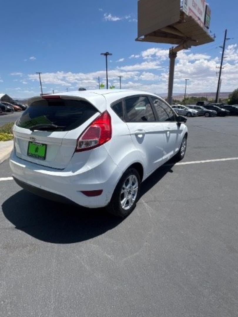 2015 Oxford White /Medium Light Stone Ford Fiesta SE Hatchback (3FADP4EJ4FM) with an 1.6L L4 DOHC 16V engine, 6-Speed Automatic transmission, located at 1865 East Red Hills Pkwy, St. George, 84770, (435) 628-0023, 37.120850, -113.543640 - We specialize in helping ALL people get the best financing available. No matter your credit score, good, bad or none we can get you an amazing rate. Had a bankruptcy, divorce, or repossessions? We give you the green light to get your credit back on the road. Low down and affordable payments that fit- Photo#7