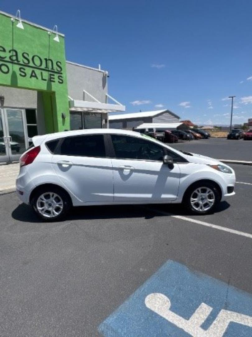 2015 Oxford White /Medium Light Stone Ford Fiesta SE Hatchback (3FADP4EJ4FM) with an 1.6L L4 DOHC 16V engine, 6-Speed Automatic transmission, located at 1865 East Red Hills Pkwy, St. George, 84770, (435) 628-0023, 37.120850, -113.543640 - We specialize in helping ALL people get the best financing available. No matter your credit score, good, bad or none we can get you an amazing rate. Had a bankruptcy, divorce, or repossessions? We give you the green light to get your credit back on the road. Low down and affordable payments that fit- Photo#8