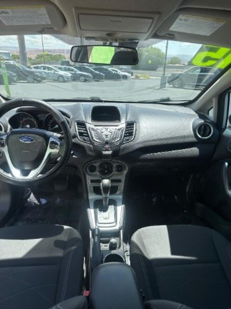2015 Oxford White /Medium Light Stone Ford Fiesta SE Hatchback (3FADP4EJ4FM) with an 1.6L L4 DOHC 16V engine, 6-Speed Automatic transmission, located at 1865 East Red Hills Pkwy, St. George, 84770, (435) 628-0023, 37.120850, -113.543640 - We specialize in helping ALL people get the best financing available. No matter your credit score, good, bad or none we can get you an amazing rate. Had a bankruptcy, divorce, or repossessions? We give you the green light to get your credit back on the road. Low down and affordable payments that fit- Photo#17