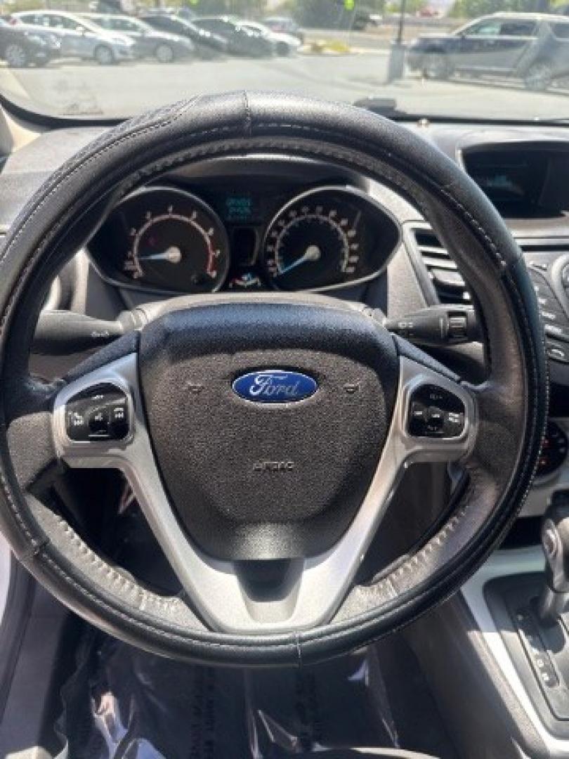 2015 Oxford White /Medium Light Stone Ford Fiesta SE Hatchback (3FADP4EJ4FM) with an 1.6L L4 DOHC 16V engine, 6-Speed Automatic transmission, located at 1865 East Red Hills Pkwy, St. George, 84770, (435) 628-0023, 37.120850, -113.543640 - We specialize in helping ALL people get the best financing available. No matter your credit score, good, bad or none we can get you an amazing rate. Had a bankruptcy, divorce, or repossessions? We give you the green light to get your credit back on the road. Low down and affordable payments that fit- Photo#18