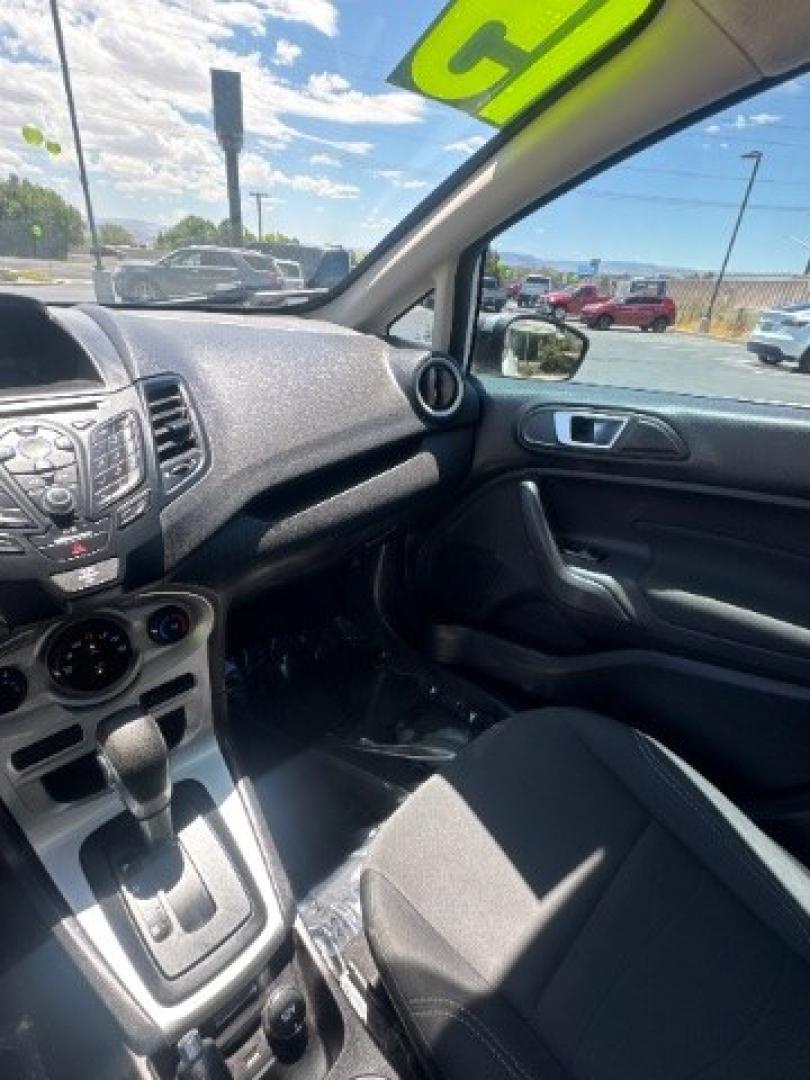 2015 Oxford White /Medium Light Stone Ford Fiesta SE Hatchback (3FADP4EJ4FM) with an 1.6L L4 DOHC 16V engine, 6-Speed Automatic transmission, located at 1865 East Red Hills Pkwy, St. George, 84770, (435) 628-0023, 37.120850, -113.543640 - We specialize in helping ALL people get the best financing available. No matter your credit score, good, bad or none we can get you an amazing rate. Had a bankruptcy, divorce, or repossessions? We give you the green light to get your credit back on the road. Low down and affordable payments that fit- Photo#22