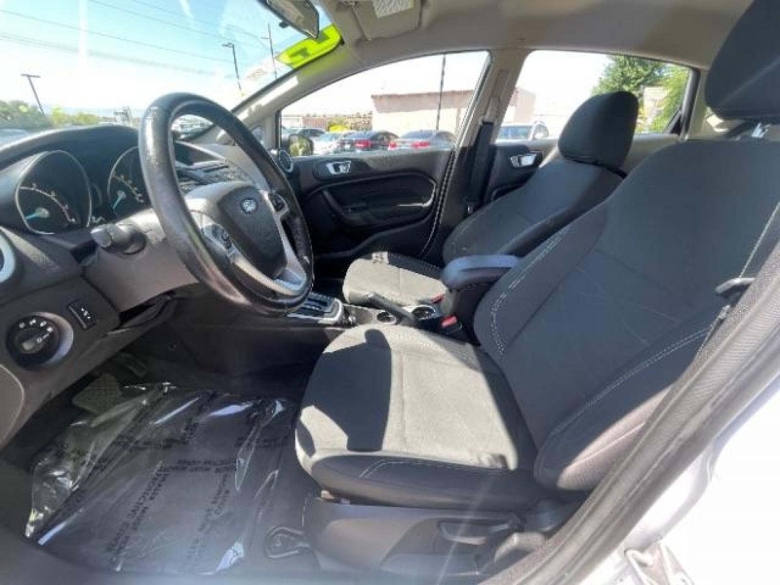 2015 Oxford White /Charcoal Black Ford Fiesta SE Hatchback (3FADP4EJ4FM) with an 1.6L L4 DOHC 16V engine, 6-Speed Automatic transmission, located at 1865 East Red Hills Pkwy, St. George, 84770, (435) 628-0023, 37.120850, -113.543640 - We specialize in helping ALL people get the best financing available. No matter your credit score, good, bad or none we can get you an amazing rate. Had a bankruptcy, divorce, or repossessions? We give you the green light to get your credit back on the road. Low down and affordable payments that fit - Photo #12