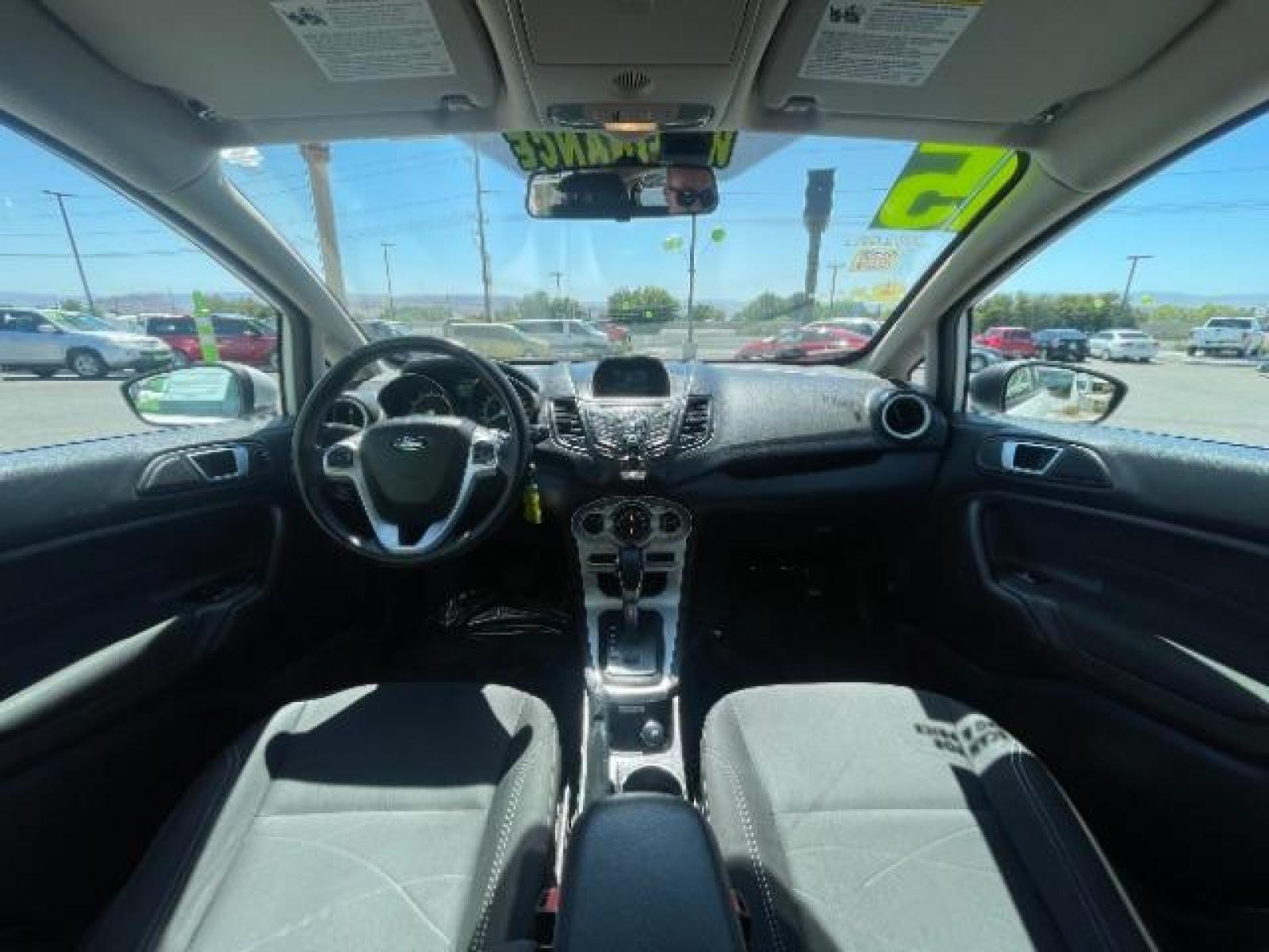 2015 Oxford White /Charcoal Black Ford Fiesta SE Hatchback (3FADP4EJ4FM) with an 1.6L L4 DOHC 16V engine, 6-Speed Automatic transmission, located at 1865 East Red Hills Pkwy, St. George, 84770, (435) 628-0023, 37.120850, -113.543640 - We specialize in helping ALL people get the best financing available. No matter your credit score, good, bad or none we can get you an amazing rate. Had a bankruptcy, divorce, or repossessions? We give you the green light to get your credit back on the road. Low down and affordable payments that fit - Photo #21
