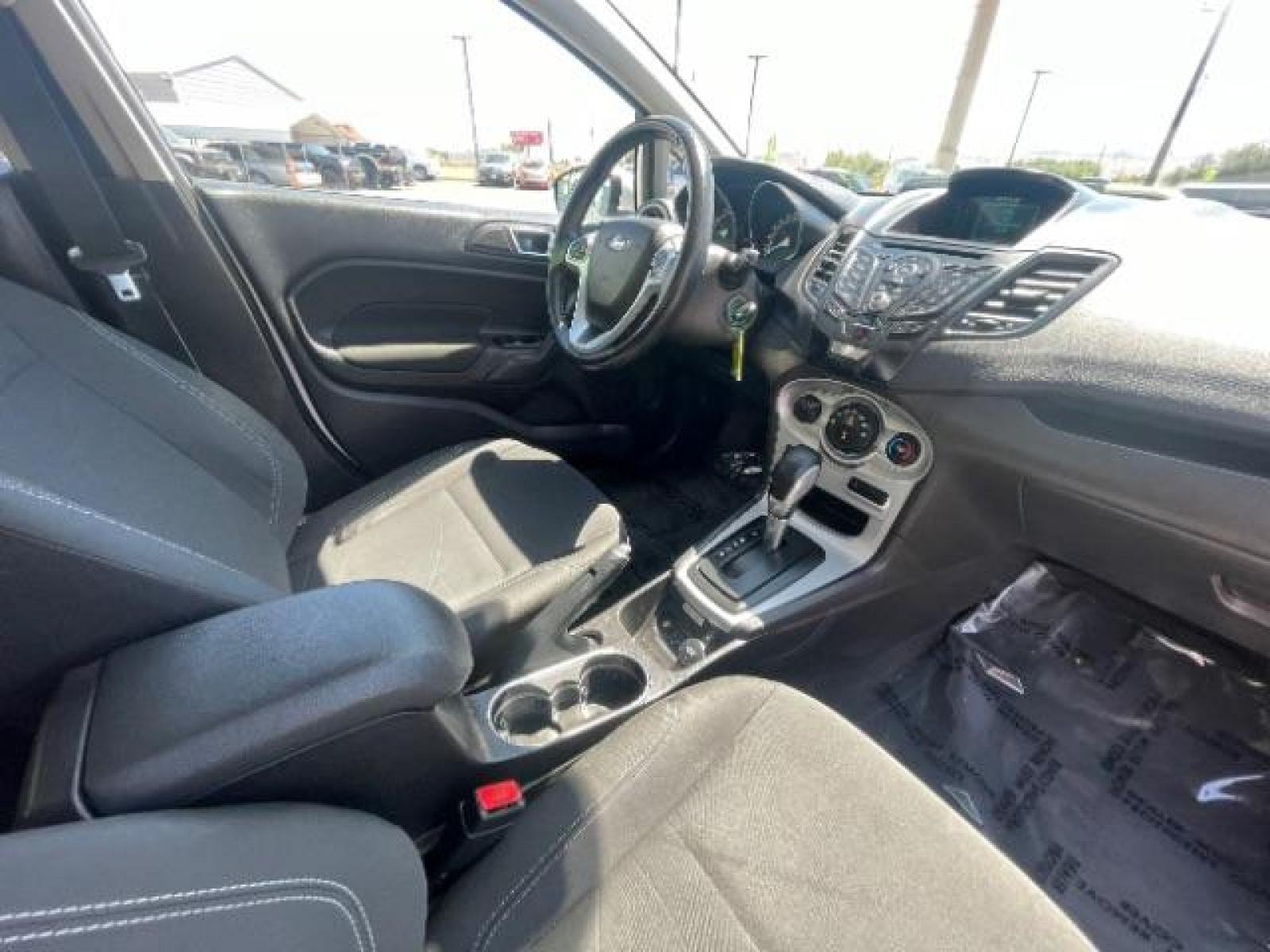 2015 Oxford White /Charcoal Black Ford Fiesta SE Hatchback (3FADP4EJ4FM) with an 1.6L L4 DOHC 16V engine, 6-Speed Automatic transmission, located at 1865 East Red Hills Pkwy, St. George, 84770, (435) 628-0023, 37.120850, -113.543640 - We specialize in helping ALL people get the best financing available. No matter your credit score, good, bad or none we can get you an amazing rate. Had a bankruptcy, divorce, or repossessions? We give you the green light to get your credit back on the road. Low down and affordable payments that fit - Photo #27