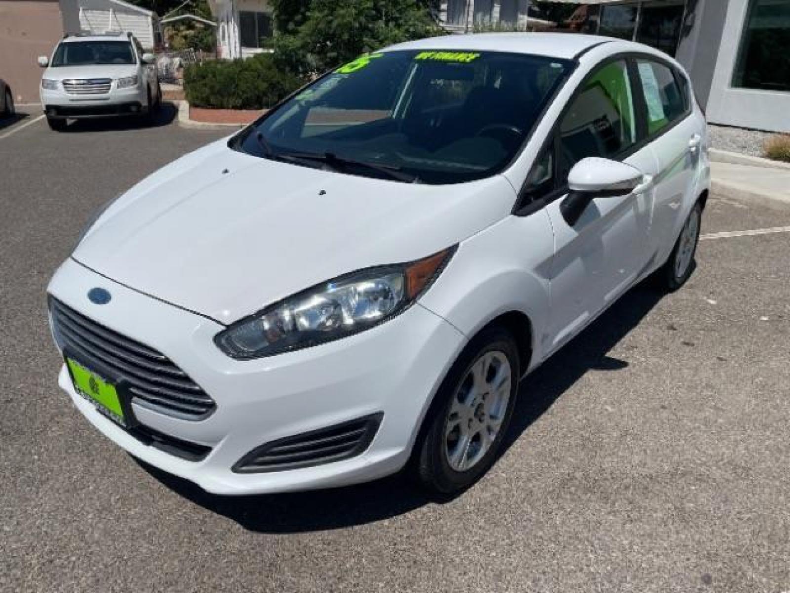 2015 Oxford White /Charcoal Black Ford Fiesta SE Hatchback (3FADP4EJ4FM) with an 1.6L L4 DOHC 16V engine, 6-Speed Automatic transmission, located at 1865 East Red Hills Pkwy, St. George, 84770, (435) 628-0023, 37.120850, -113.543640 - We specialize in helping ALL people get the best financing available. No matter your credit score, good, bad or none we can get you an amazing rate. Had a bankruptcy, divorce, or repossessions? We give you the green light to get your credit back on the road. Low down and affordable payments that fit - Photo #3