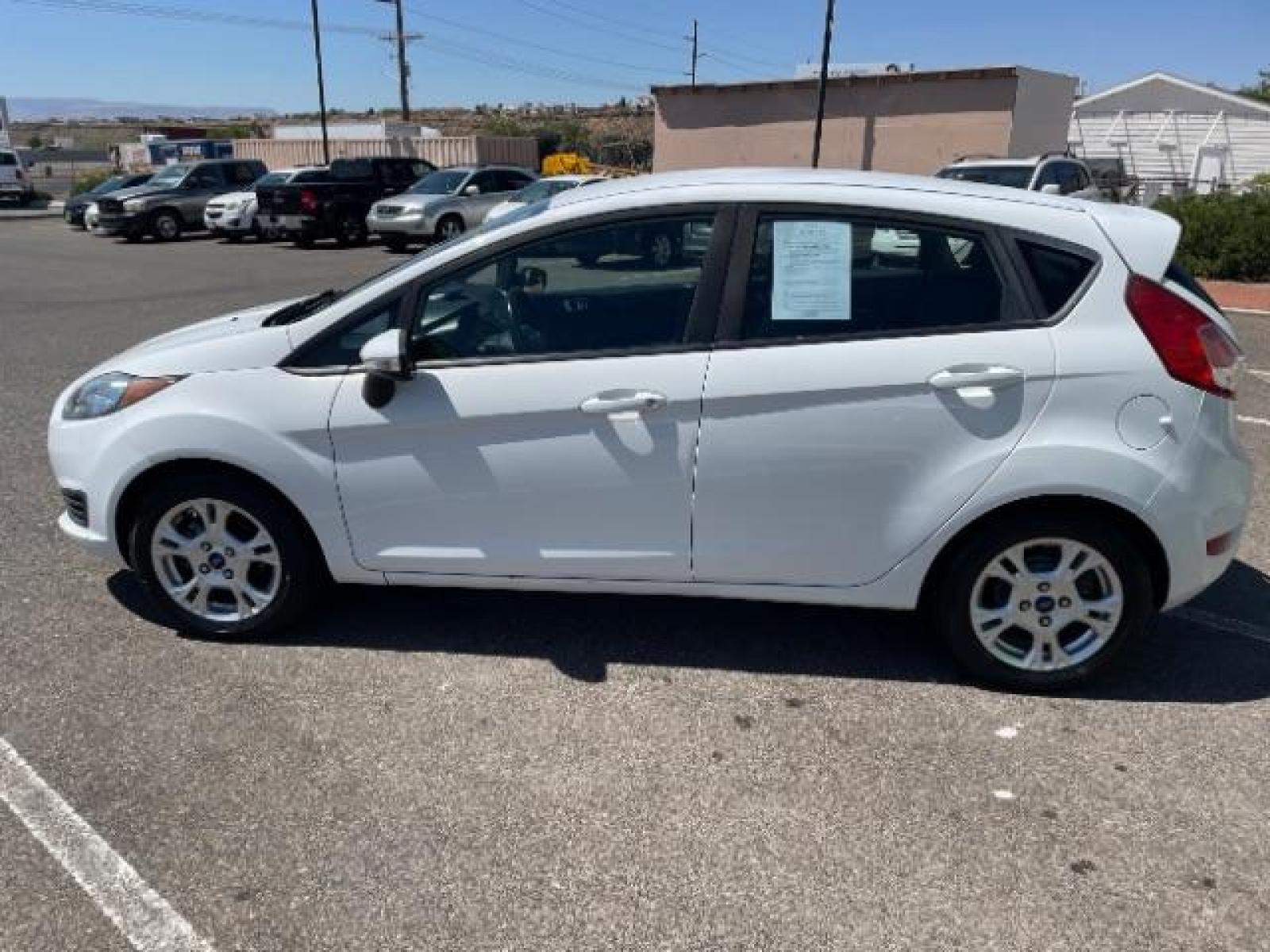 2015 Oxford White /Charcoal Black Ford Fiesta SE Hatchback (3FADP4EJ4FM) with an 1.6L L4 DOHC 16V engine, 6-Speed Automatic transmission, located at 1865 East Red Hills Pkwy, St. George, 84770, (435) 628-0023, 37.120850, -113.543640 - We specialize in helping ALL people get the best financing available. No matter your credit score, good, bad or none we can get you an amazing rate. Had a bankruptcy, divorce, or repossessions? We give you the green light to get your credit back on the road. Low down and affordable payments that fit - Photo #5