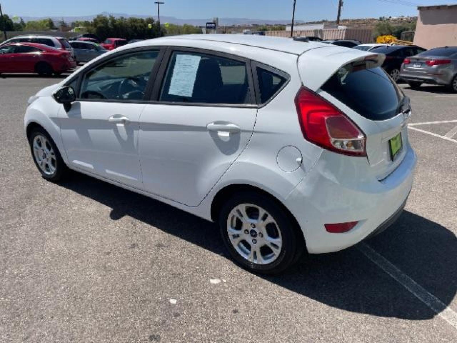 2015 Oxford White /Charcoal Black Ford Fiesta SE Hatchback (3FADP4EJ4FM) with an 1.6L L4 DOHC 16V engine, 6-Speed Automatic transmission, located at 1865 East Red Hills Pkwy, St. George, 84770, (435) 628-0023, 37.120850, -113.543640 - We specialize in helping ALL people get the best financing available. No matter your credit score, good, bad or none we can get you an amazing rate. Had a bankruptcy, divorce, or repossessions? We give you the green light to get your credit back on the road. Low down and affordable payments that fit - Photo #6