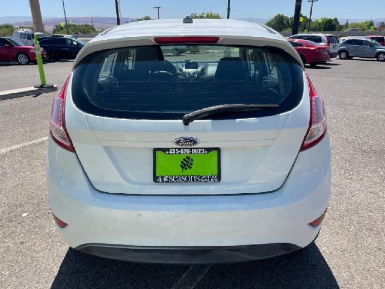 2015 Oxford White /Charcoal Black Ford Fiesta SE Hatchback (3FADP4EJ4FM) with an 1.6L L4 DOHC 16V engine, 6-Speed Automatic transmission, located at 1865 East Red Hills Pkwy, St. George, 84770, (435) 628-0023, 37.120850, -113.543640 - We specialize in helping ALL people get the best financing available. No matter your credit score, good, bad or none we can get you an amazing rate. Had a bankruptcy, divorce, or repossessions? We give you the green light to get your credit back on the road. Low down and affordable payments that fit - Photo #8