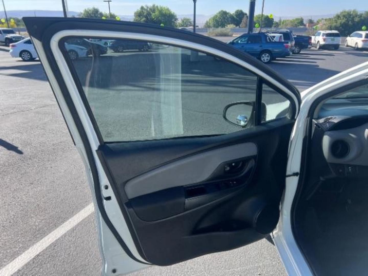 2015 Super White /Black (Circles), clo Toyota Yaris LE 5-Door AT (VNKKTUD39FA) with an 1.5L L4 DOHC 16V engine, 4-Speed Automatic transmission, located at 940 North Main Street, Cedar City, UT, 84720, (435) 628-0023, 37.692936, -113.061897 - We specialize in helping ALL people get the best financing available. No matter your credit score, good, bad or none we can get you an amazing rate. Had a bankruptcy, divorce, or repossessions? We give you the green light to get your credit back on the road. Low down and affordable payments that fit - Photo#12
