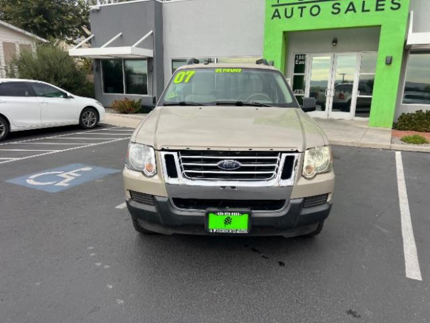 2007 Pueblo Gold Metallic /Camel Cloth Interior Ford Explorer Sport Trac XLT 4.0L 4WD (1FMEU51K07U) with an 4.0L V6 SOHC 12V FFV engine, 5-Speed Automatic transmission, located at 1865 East Red Hills Pkwy, St. George, 84770, (435) 628-0023, 37.120850, -113.543640 - We specialize in helping ALL people get the best financing available. No matter your credit score, good, bad or none we can get you an amazing rate. Had a bankruptcy, divorce, or repossessions? We give you the green light to get your credit back on the road. Low down and affordable payments that fit - Photo#1