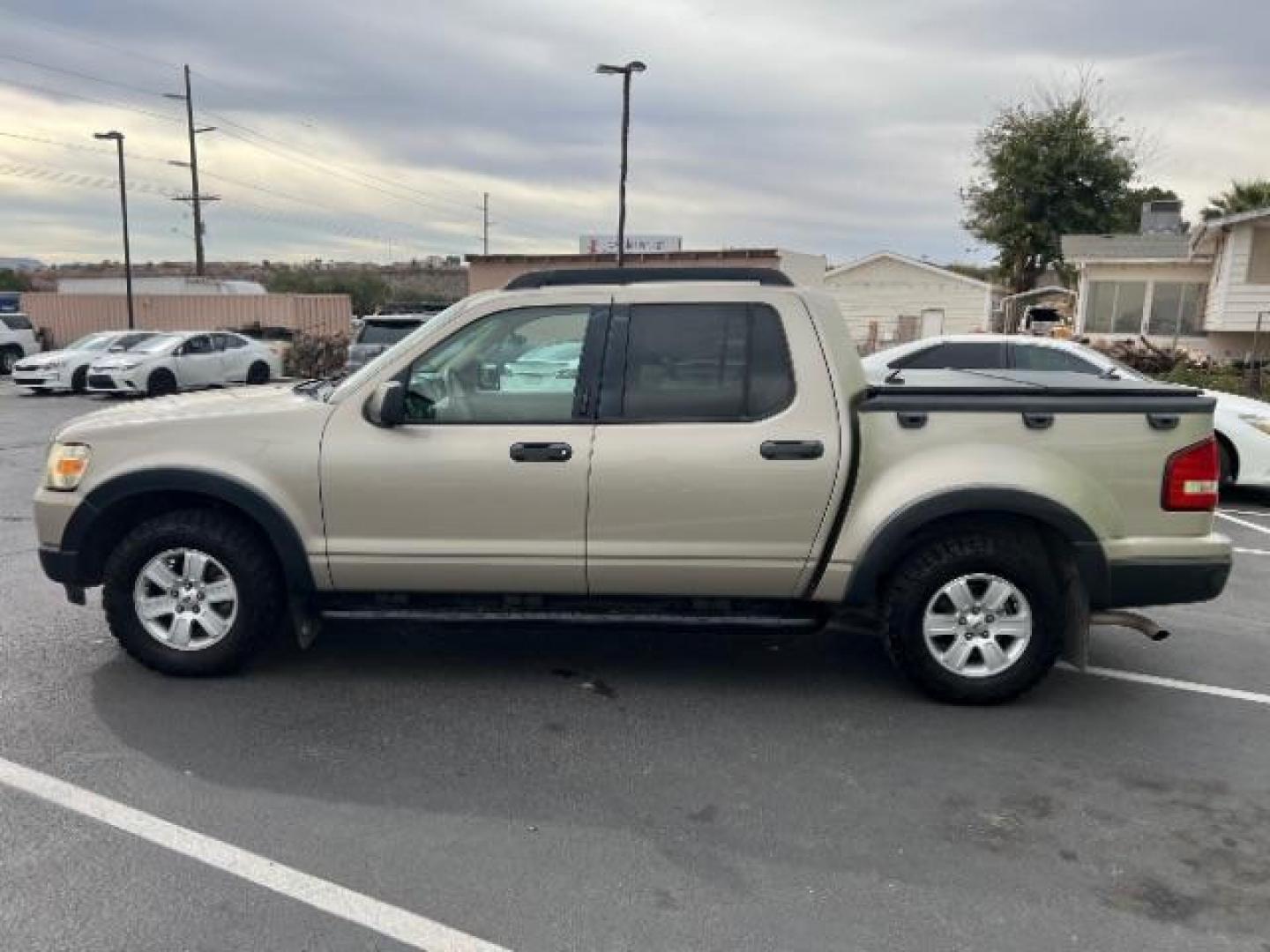 2007 Pueblo Gold Metallic /Camel Cloth Interior Ford Explorer Sport Trac XLT 4.0L 4WD (1FMEU51K07U) with an 4.0L V6 SOHC 12V FFV engine, 5-Speed Automatic transmission, located at 1865 East Red Hills Pkwy, St. George, 84770, (435) 628-0023, 37.120850, -113.543640 - We specialize in helping ALL people get the best financing available. No matter your credit score, good, bad or none we can get you an amazing rate. Had a bankruptcy, divorce, or repossessions? We give you the green light to get your credit back on the road. Low down and affordable payments that fit - Photo#3