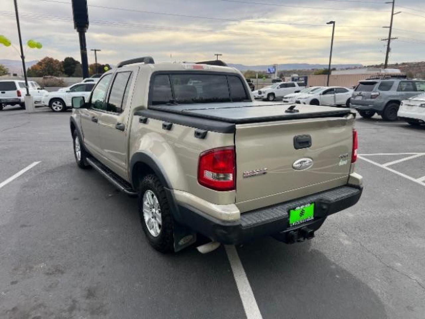 2007 Pueblo Gold Metallic /Camel Cloth Interior Ford Explorer Sport Trac XLT 4.0L 4WD (1FMEU51K07U) with an 4.0L V6 SOHC 12V FFV engine, 5-Speed Automatic transmission, located at 1865 East Red Hills Pkwy, St. George, 84770, (435) 628-0023, 37.120850, -113.543640 - We specialize in helping ALL people get the best financing available. No matter your credit score, good, bad or none we can get you an amazing rate. Had a bankruptcy, divorce, or repossessions? We give you the green light to get your credit back on the road. Low down and affordable payments that fit - Photo#4