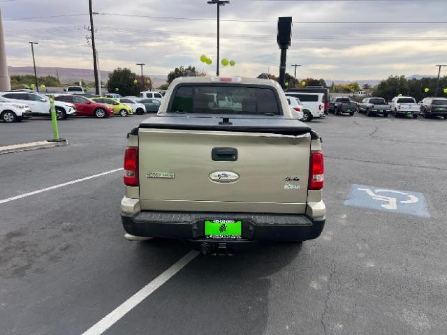 2007 Pueblo Gold Metallic /Camel Cloth Interior Ford Explorer Sport Trac XLT 4.0L 4WD (1FMEU51K07U) with an 4.0L V6 SOHC 12V FFV engine, 5-Speed Automatic transmission, located at 1865 East Red Hills Pkwy, St. George, 84770, (435) 628-0023, 37.120850, -113.543640 - We specialize in helping ALL people get the best financing available. No matter your credit score, good, bad or none we can get you an amazing rate. Had a bankruptcy, divorce, or repossessions? We give you the green light to get your credit back on the road. Low down and affordable payments that fit - Photo#5
