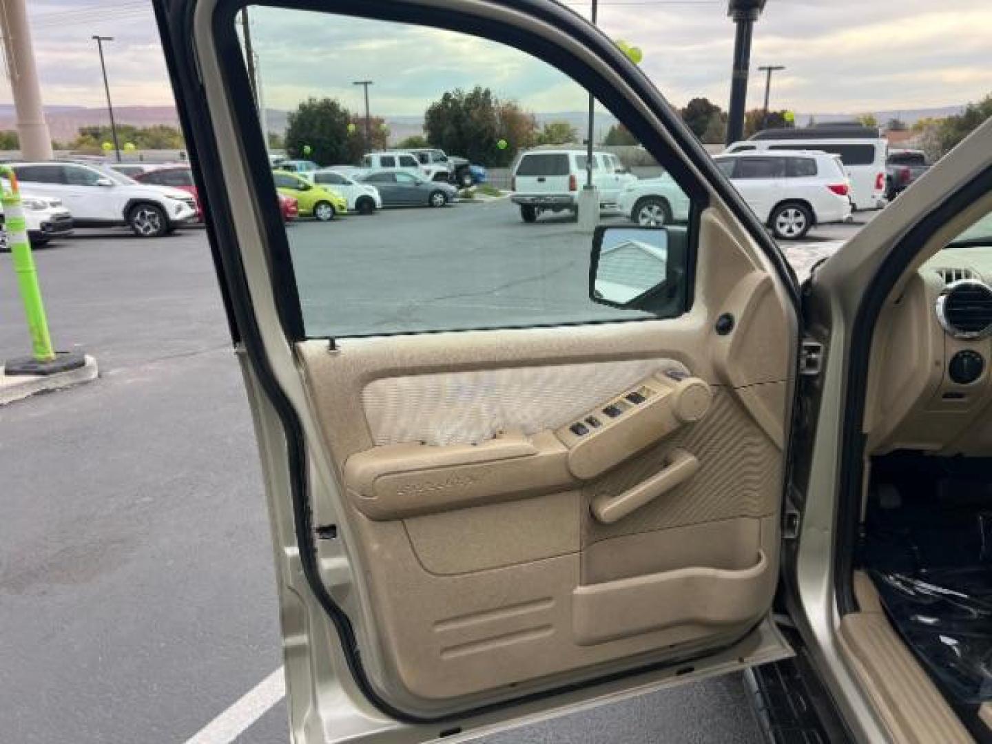 2007 Pueblo Gold Metallic /Camel Cloth Interior Ford Explorer Sport Trac XLT 4.0L 4WD (1FMEU51K07U) with an 4.0L V6 SOHC 12V FFV engine, 5-Speed Automatic transmission, located at 1865 East Red Hills Pkwy, St. George, 84770, (435) 628-0023, 37.120850, -113.543640 - We specialize in helping ALL people get the best financing available. No matter your credit score, good, bad or none we can get you an amazing rate. Had a bankruptcy, divorce, or repossessions? We give you the green light to get your credit back on the road. Low down and affordable payments that fit - Photo#12